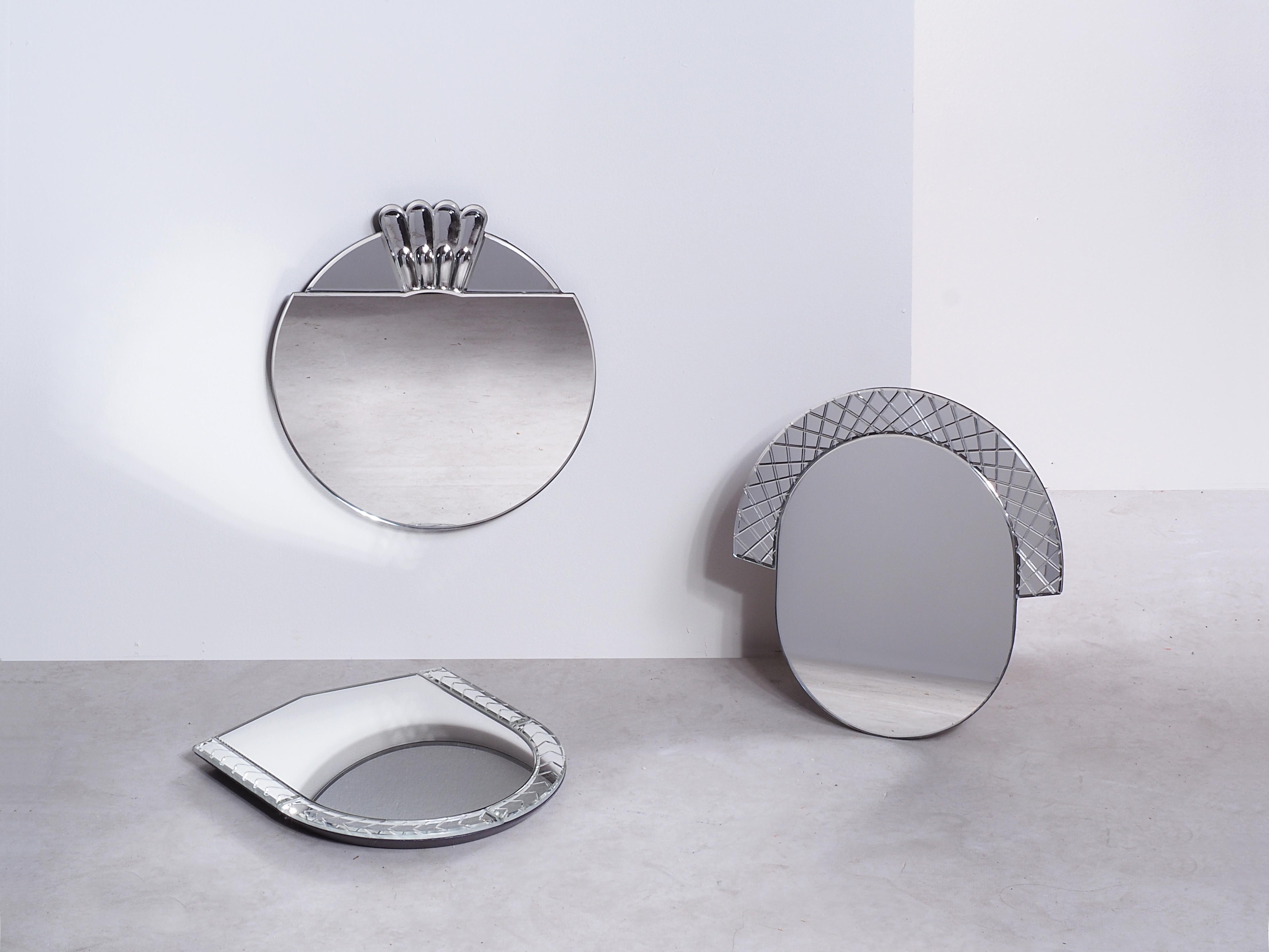 Set of 3 Small Scena Elemento Murano Mirrors by Nikolai Kotlarczyk
Dimensions: D 3 x W 30 x H 30 cm (each). 
Materials: silvered carved glass, dark gray wood back.
Also available in other designs and dimensions. Please contact us for more