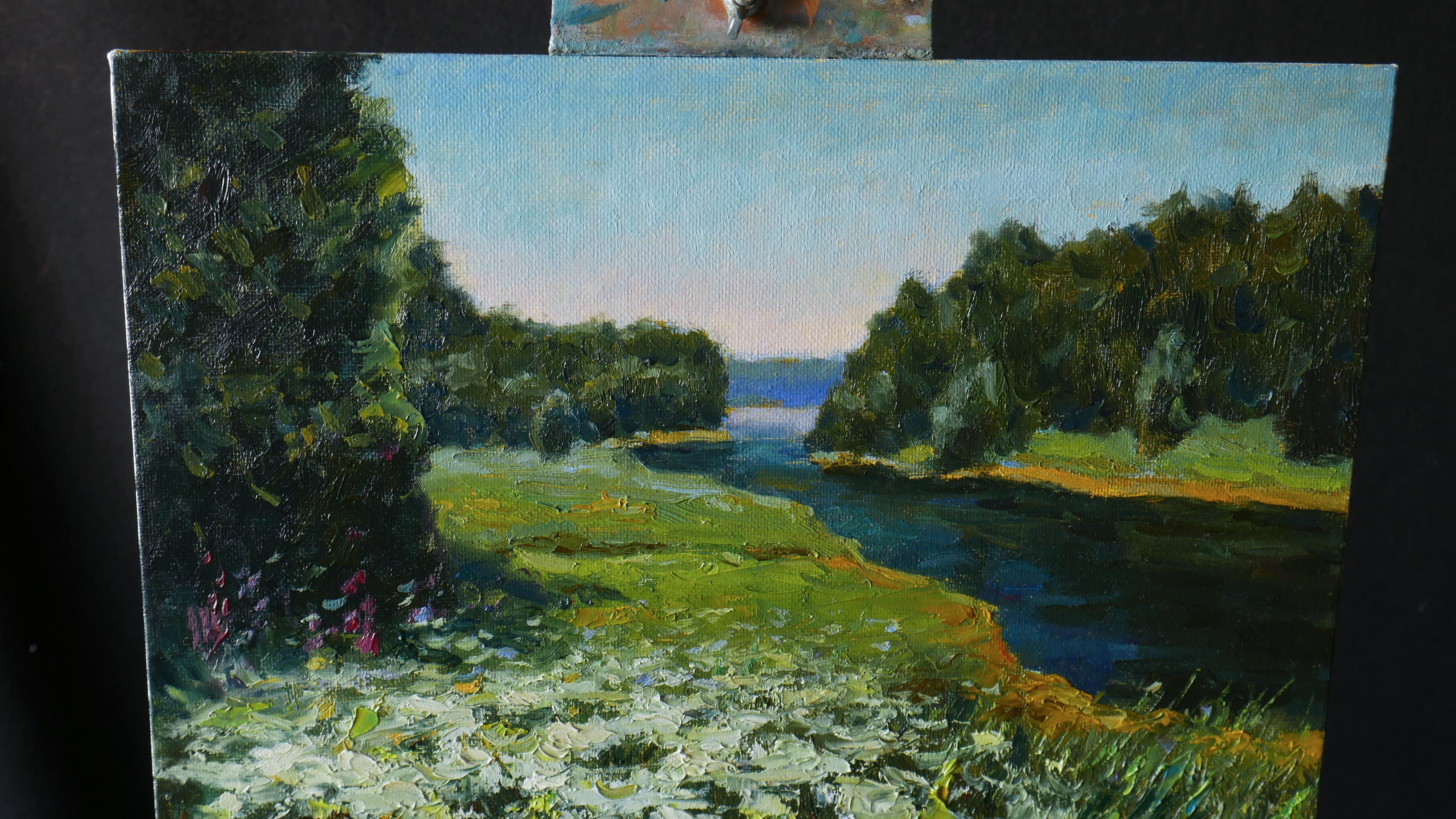 A summer landscape with a river, forest and wildflowers is a beautiful decoration for any interior. The painting is created en plein-air in one of favourite artist's place. The play of warm and cold shades bewitches and creates a unique fabulous