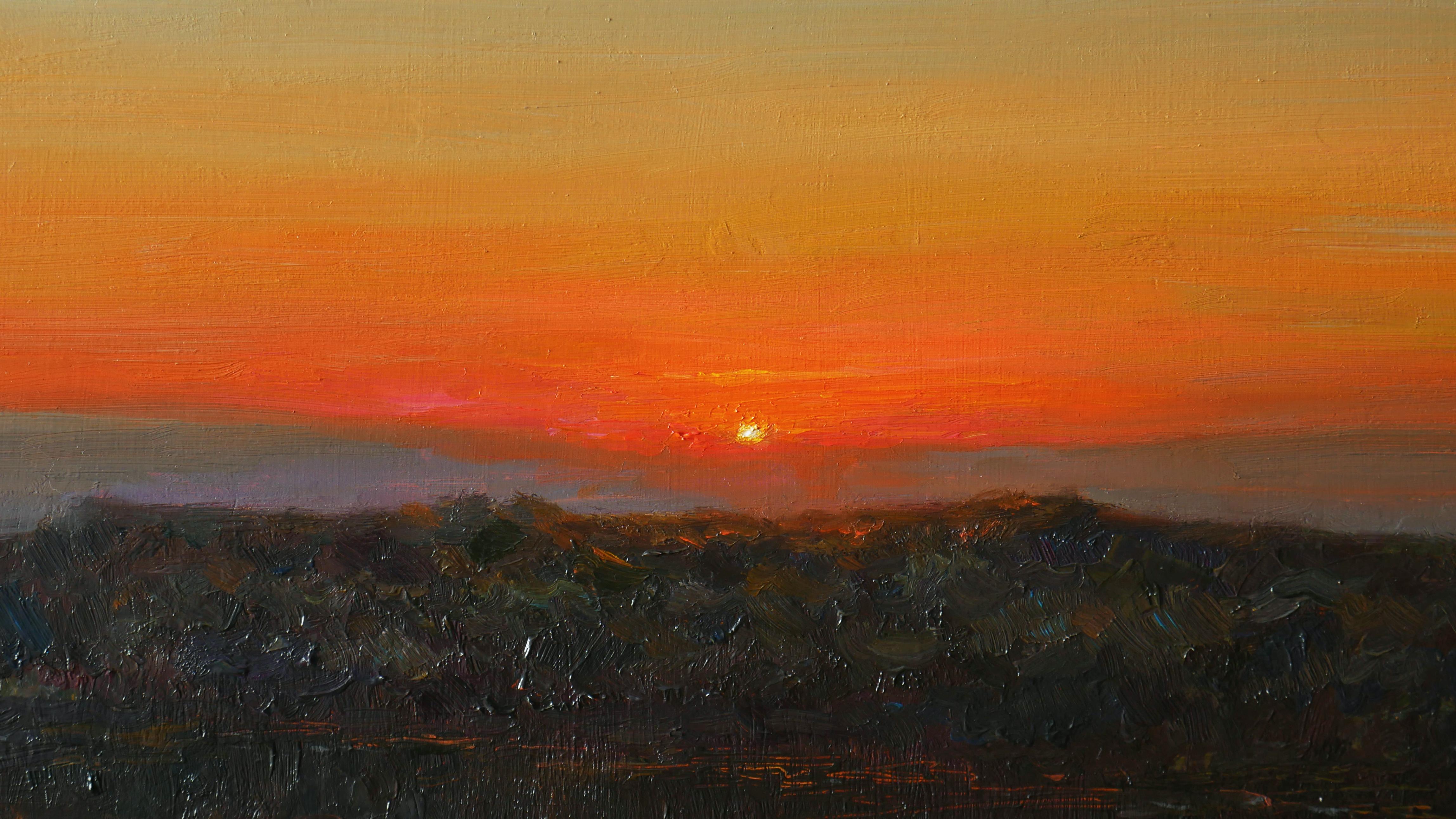 As the Sun dips below the horizon, the summer sky transforms into a breathtaking canvas of vibrant hues. The river, calm and reflective, mirrors the kaleidoscope of colors above – soft pinks, fiery oranges, and deep purples blending seamlessly.