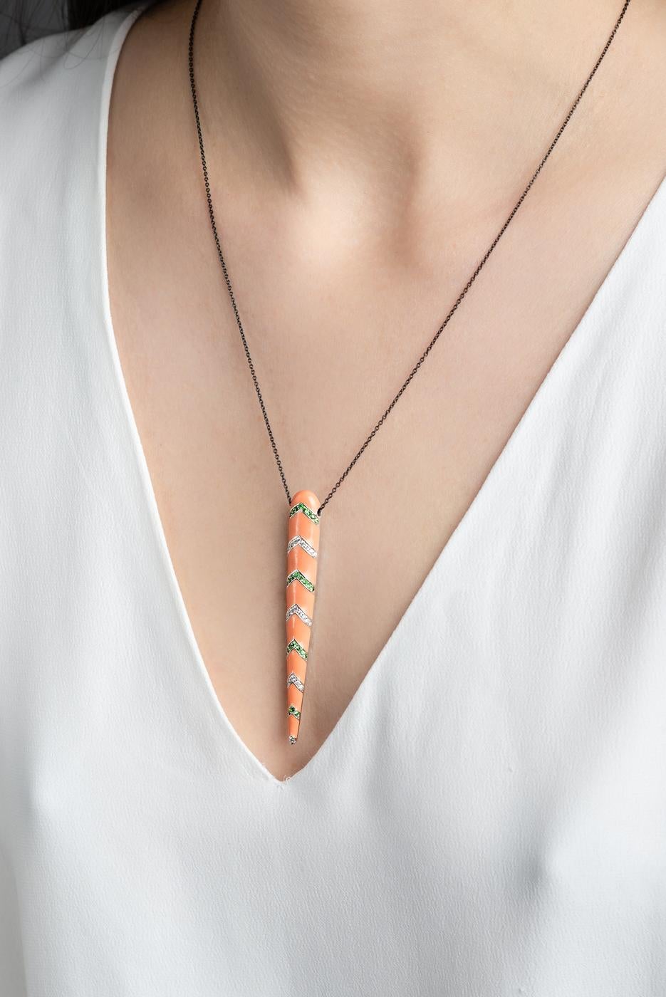 Featured From Nikos Koulis's Spectrum Collection, pendant with 0,25 carats of white diamonds, 0,26 cts of tsavorites, orange enamel & black rhodium. Part of his Spectrum collection, inspired by the prism of light, rays of the Mediterrenean sun, this