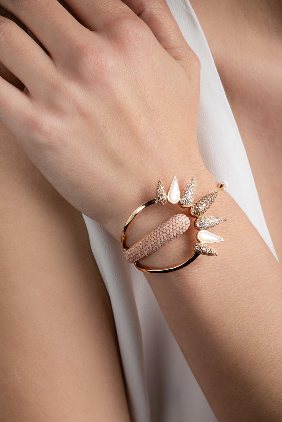 Nikos Koulis presents from his Remarkable Spectrum Collection,  the 18 Karat Rose Gold Clamper Bracelet with 1,18 carats white diamonds, 1,41 cts brown diamonds, 5,14 cts pink topaz & 2,28 cts mother of pearl. 
