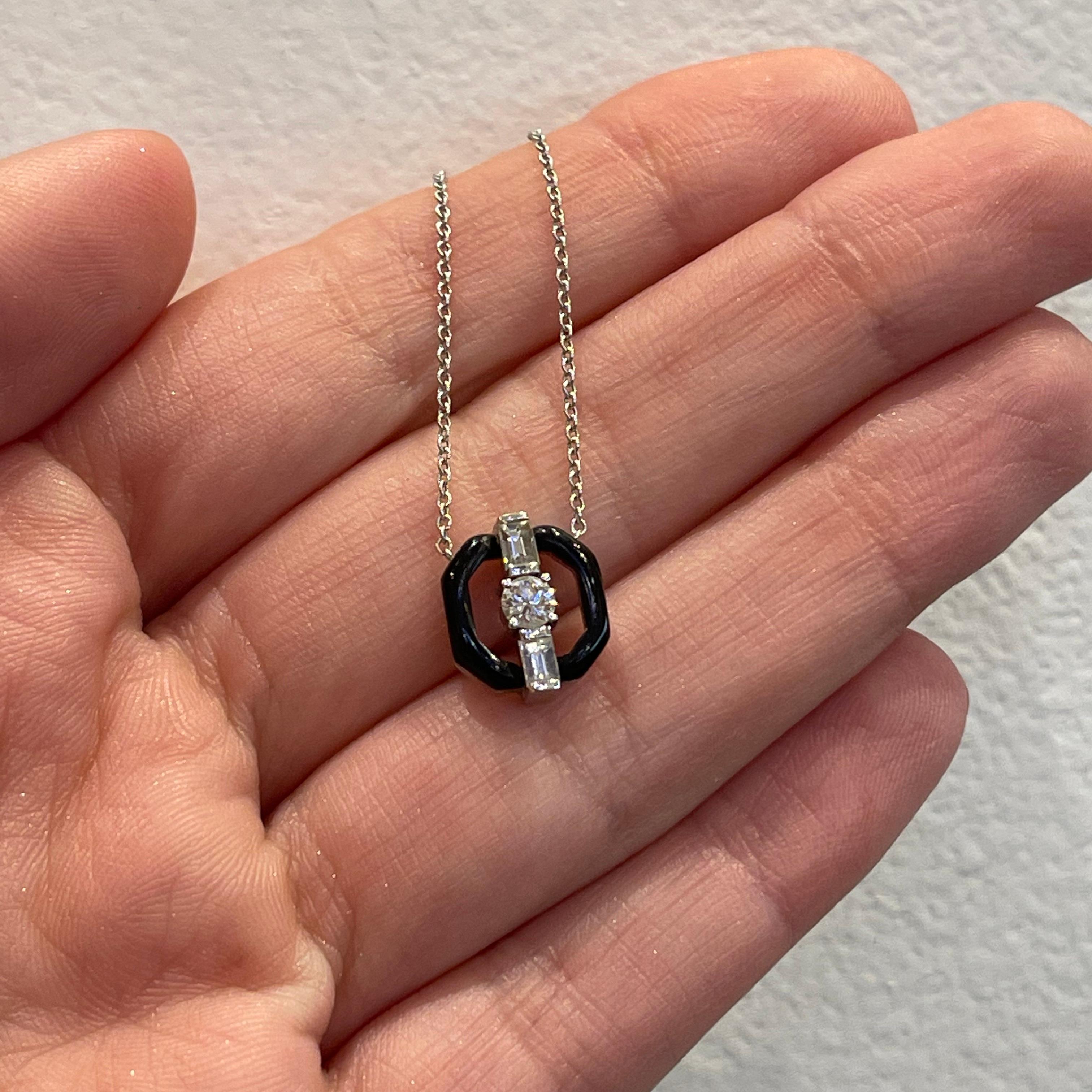 Oui by Nikos Koulis is the most celebrated collection that is most recognized for its evolving designs while maintaining the innovative signature style with the black enamel element and exceptional stone quality. The collection is continually
