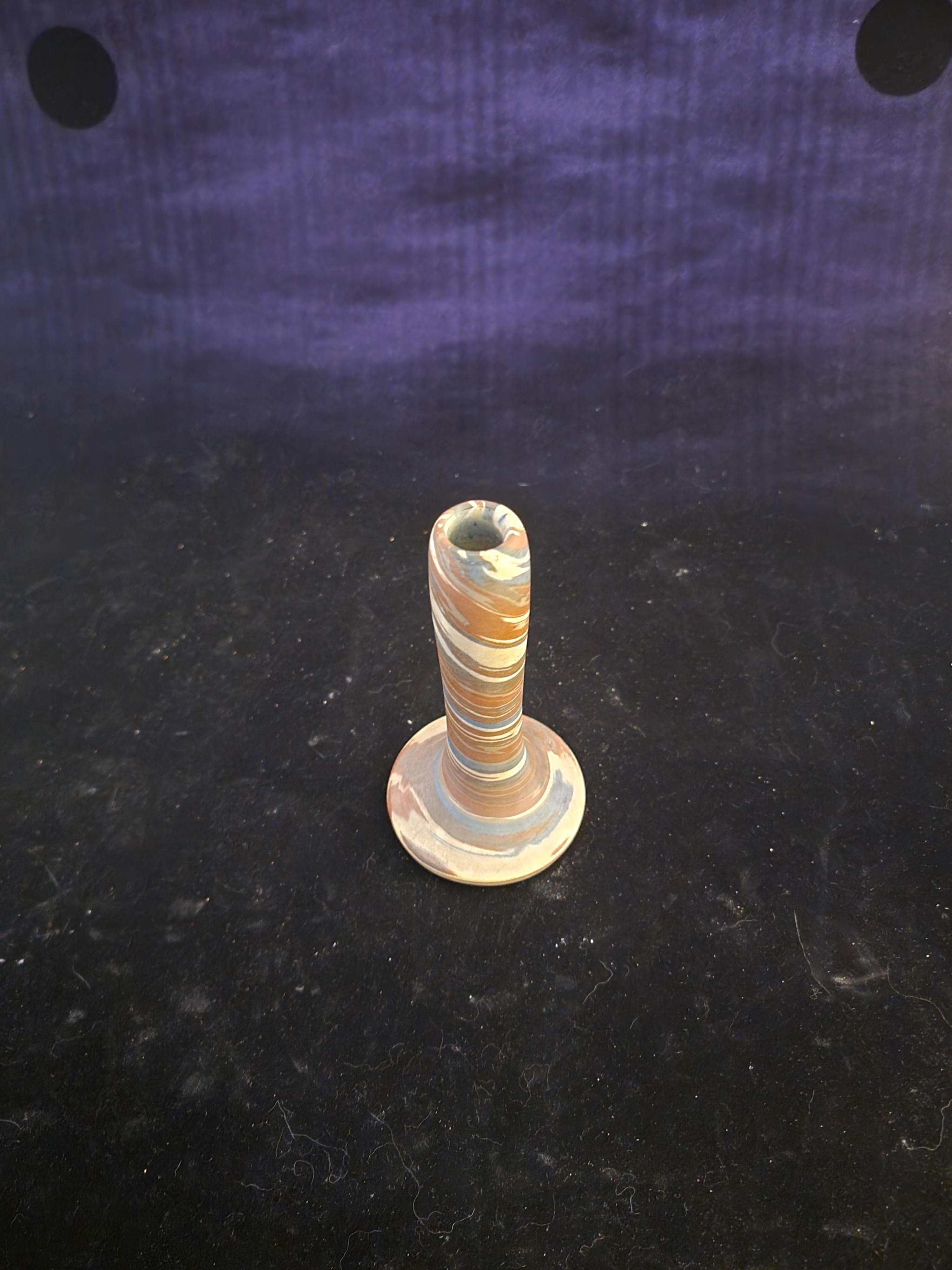 This is a rare Niloak Piece of Pottery there was not a category in our great list for Niloak. It is Mission Swirl. This is a rare, delicately fashioned piece for Niloak Mission arts Swirl. It is a bud vase that will grace a nightstand, a breakfast