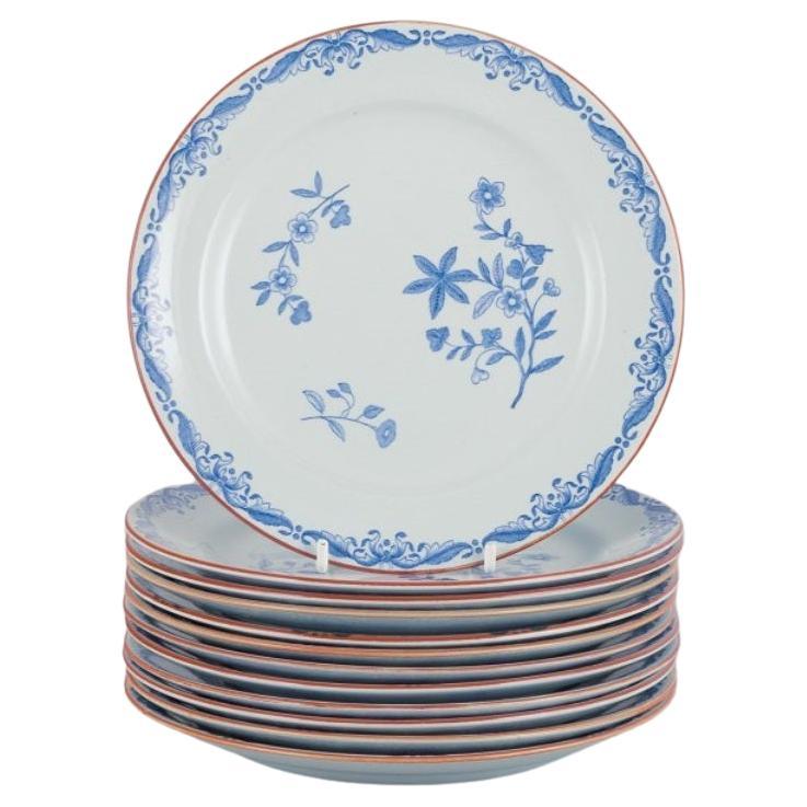 Nils Emil Lundström for Rörstrand. Set of twelve "Ostindia" plates in faience For Sale