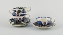 Nils Joakim Kähler for Kähler. Set of four "Marguerit" teacups and saucers.