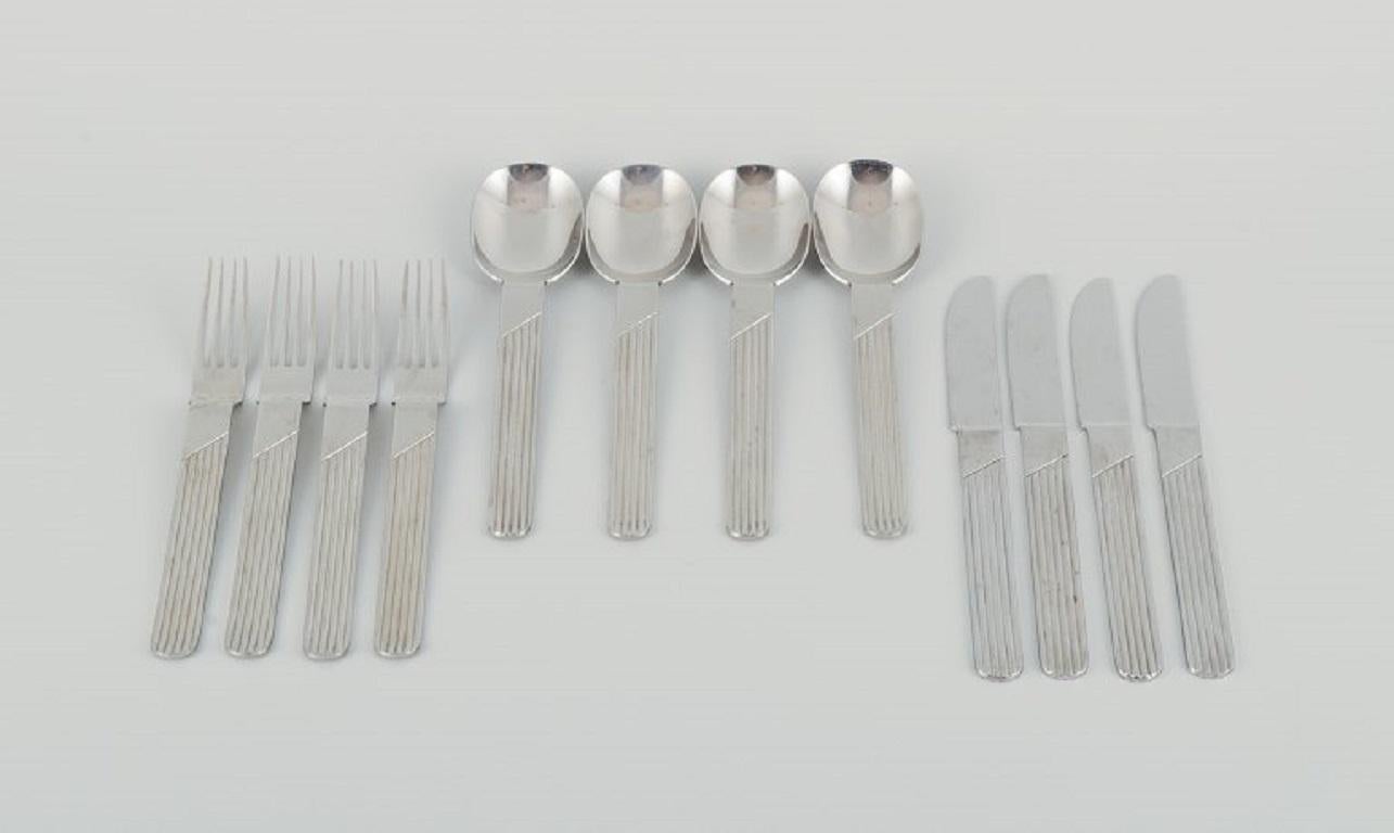 Nils Johan. Modernist Swedish design. Complete dinner service for four persons.
Stainless steel.
Approx. 1970s.
In perfect condition.
Marked.
Knife measuring: 21 cm.
 