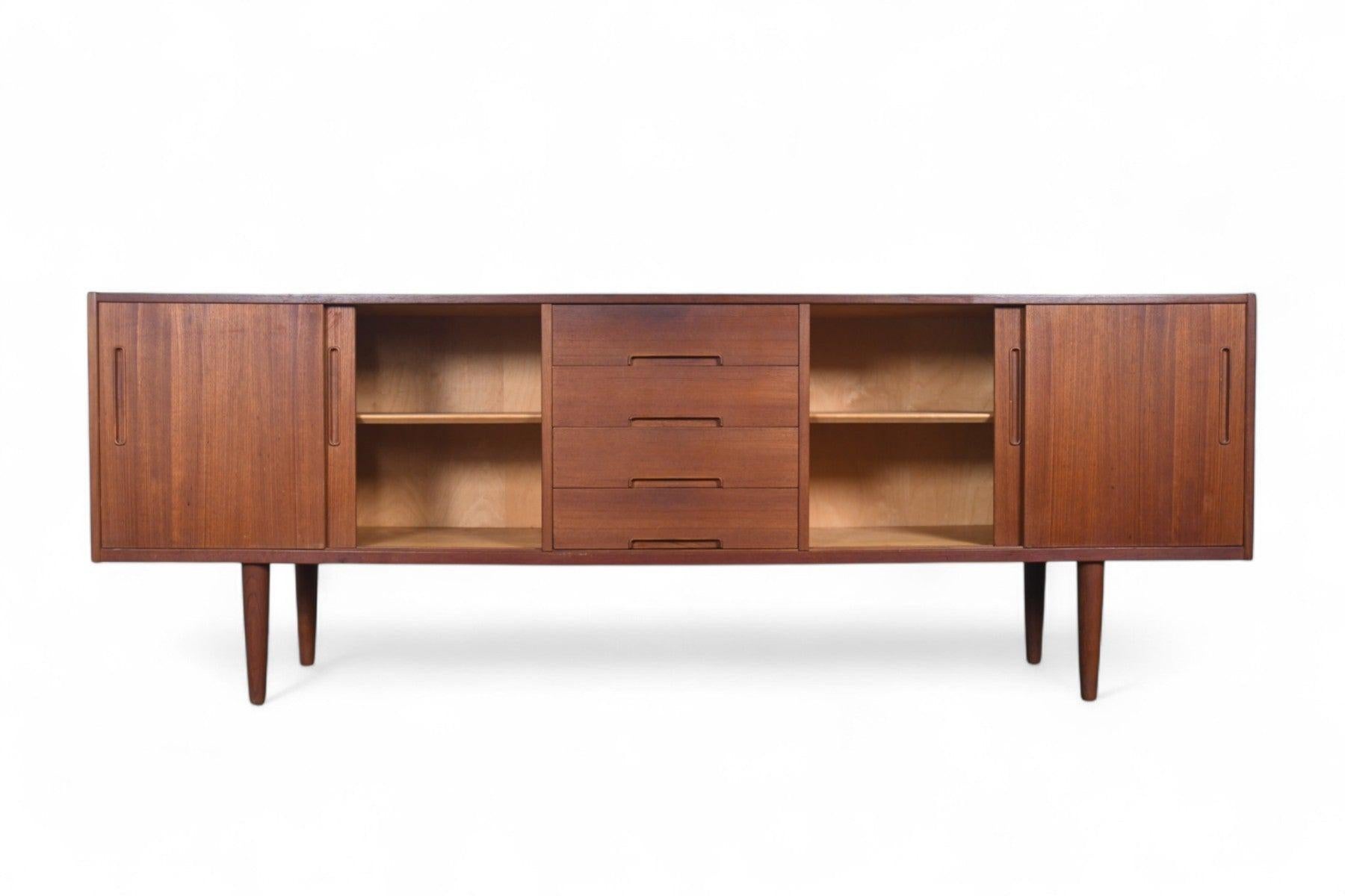 Origin: Sweden
Designer: Nils Jonsson
Manufacturer: Troeds
Era: 1960s
Materials: Teak
Dimensions: 86.5” wide x 17” deep x 31” tall