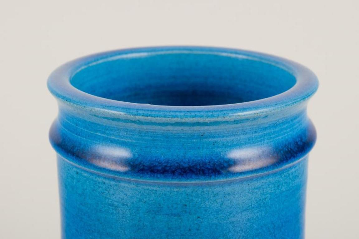 Danish Nils Kähler for Kähler.  Cylindrical ceramic vase.  Azure glaze. 1960s/70s. For Sale