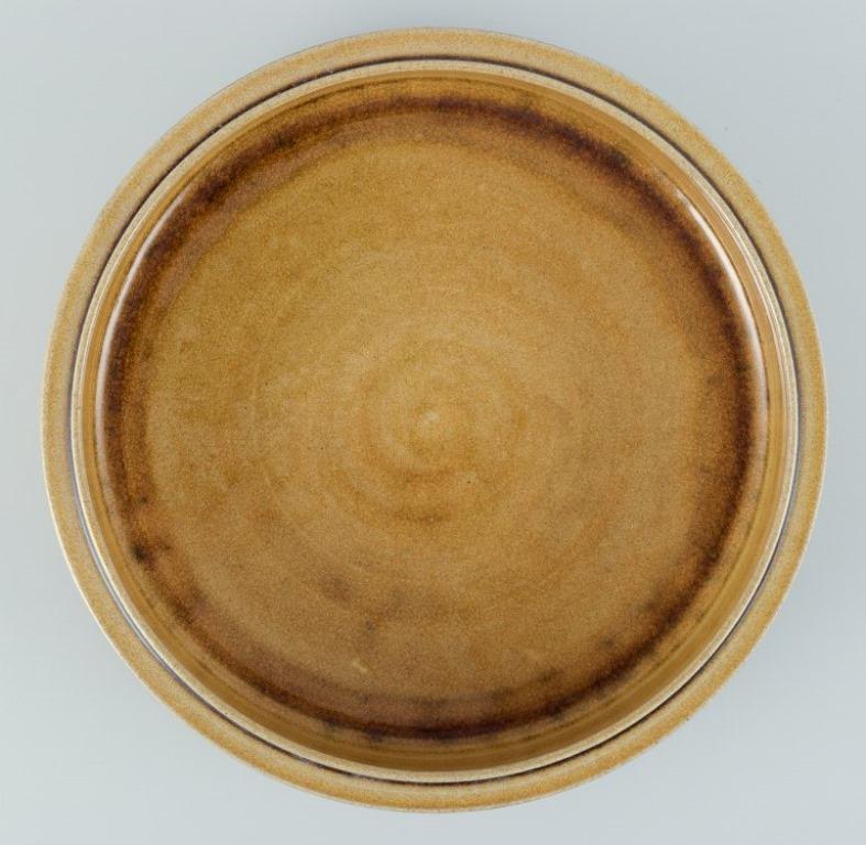 Danish Nils Kähler for Kähler. Large ceramic bowl with uranium yellow glaze. For Sale