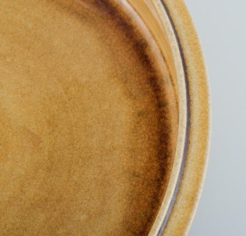 Glazed Nils Kähler for Kähler. Large ceramic bowl with uranium yellow glaze. For Sale