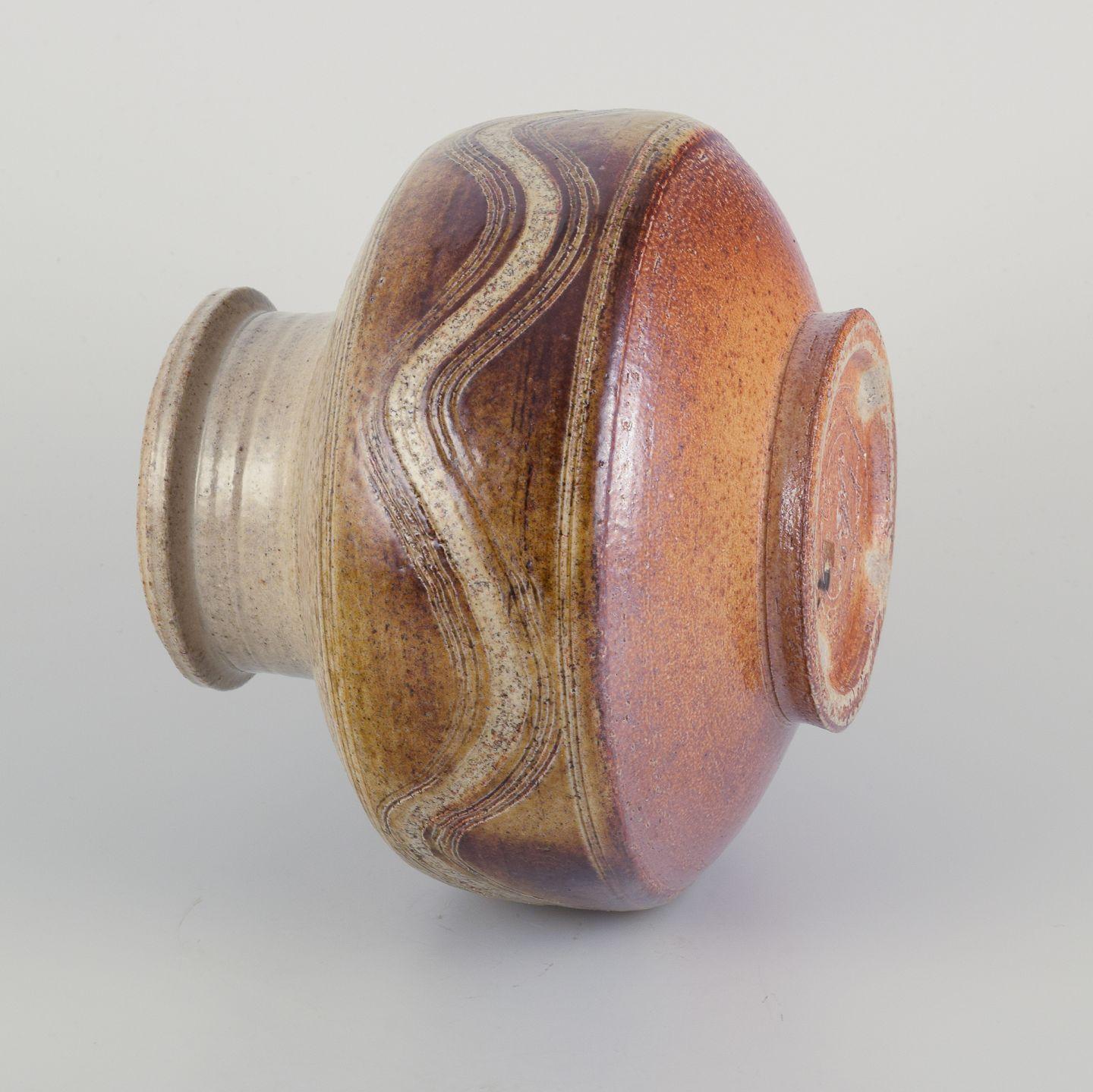 Mid-20th Century Nils Kähler for Kähler. Modernist ceramic vase. Glaze in brown and sandy tones. For Sale