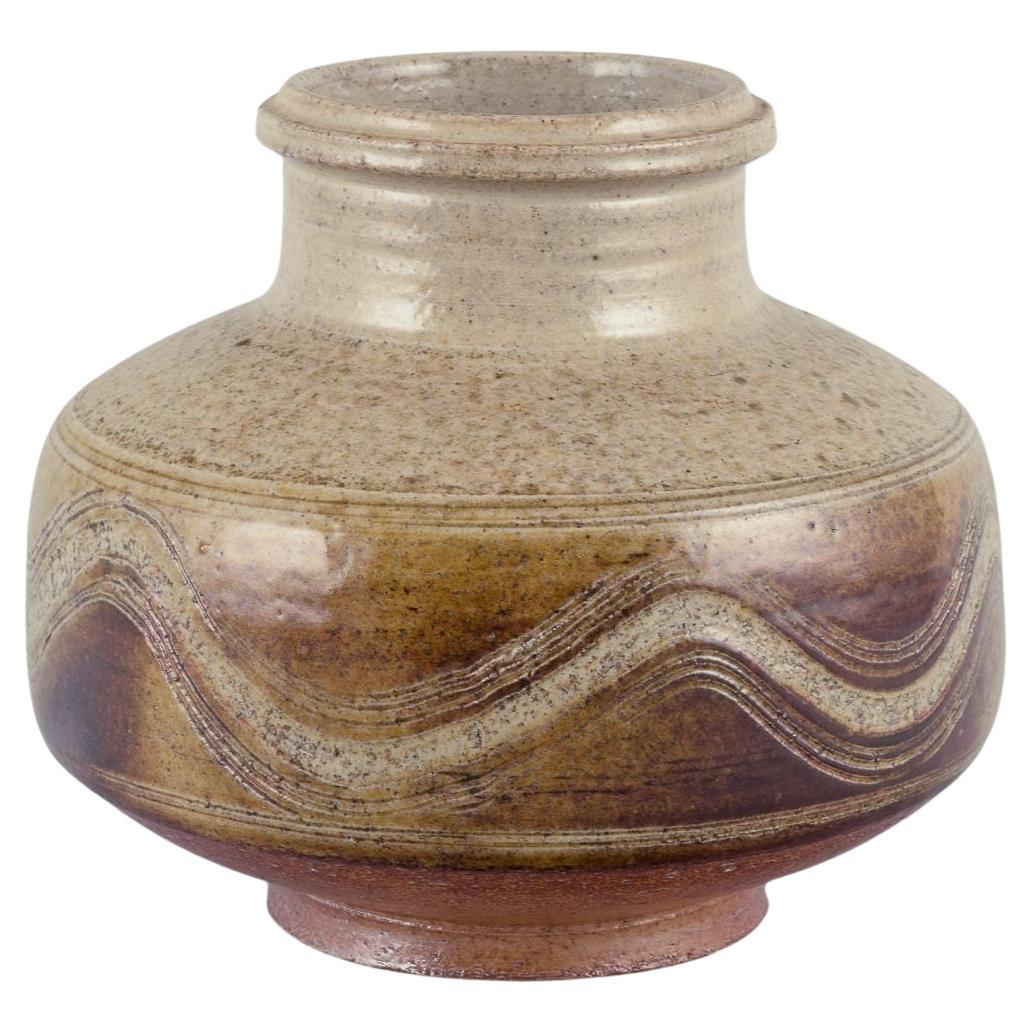 Nils Kähler for Kähler. Modernist ceramic vase. Glaze in brown and sandy tones. For Sale