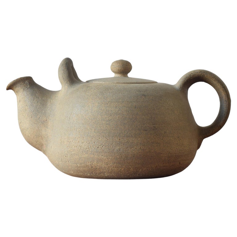 https://a.1stdibscdn.com/nils-kahler-huge-decorative-ceramic-teapot-brutalist-unglazed-hak-denmark-1950s-for-sale/f_49132/f_308675321665864113211/f_30867532_1665864114138_bg_processed.jpg?width=768