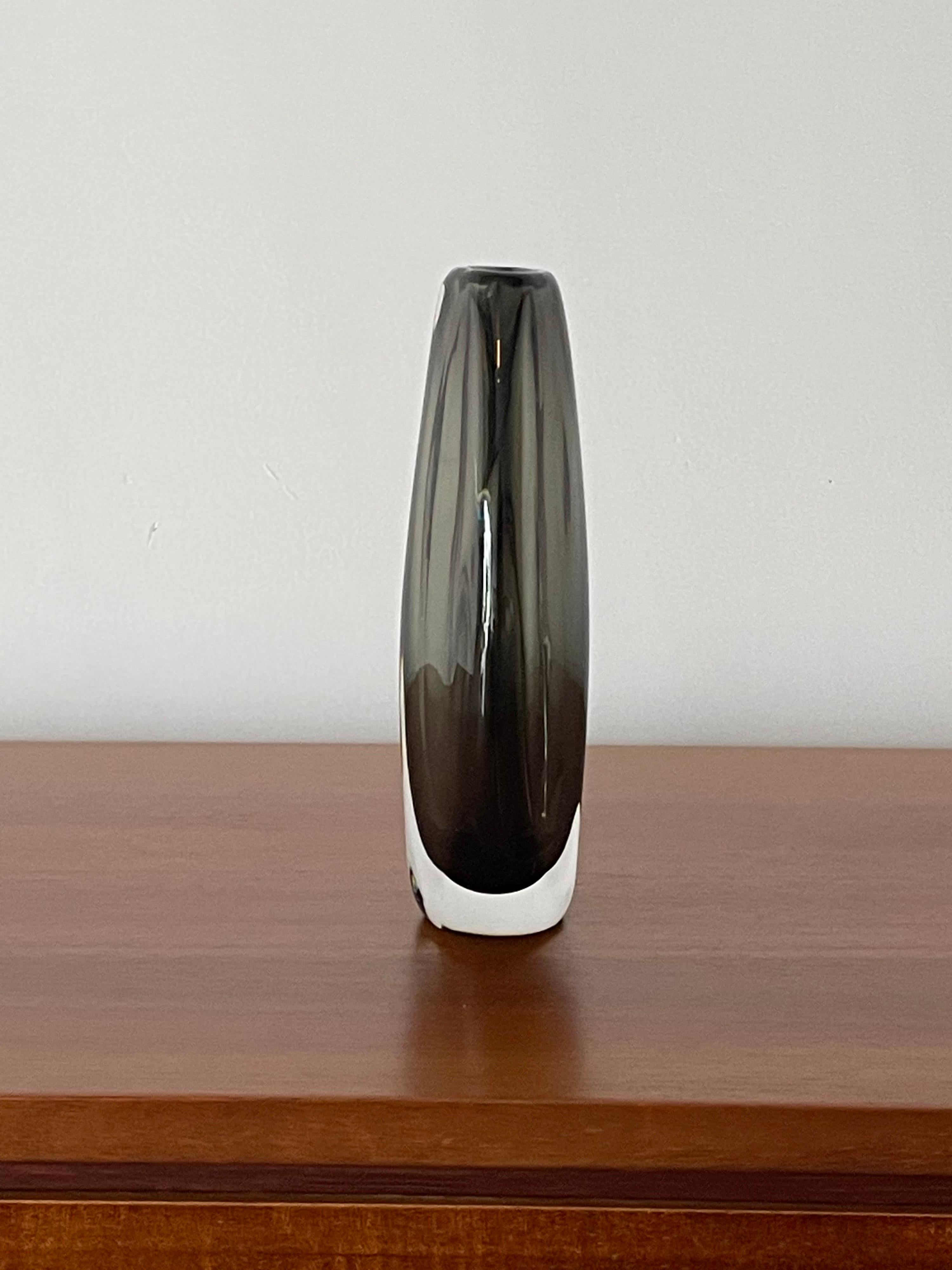 Elegant glass vase designed by Nils Landberg for Orrefors executed in 