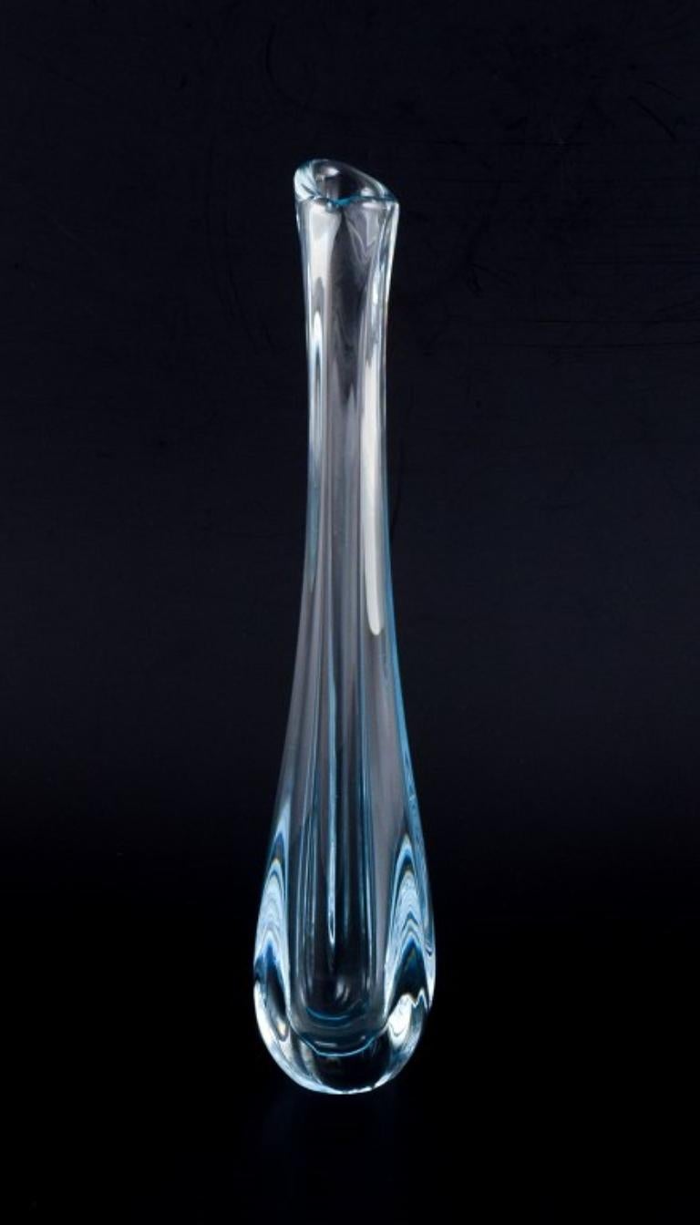 Nils Landberg for Orrefors, Sweden. 
Tall and slender art glass vase in clear glass.
1930s/40s.
Signed.
Perfect condition.
Dimensions: H 34.0 cm x D 7.0 cm.
