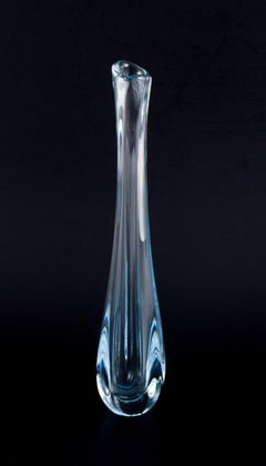 Nils Landberg for Orrefors, Sweden. Tall and slender art glass vase.