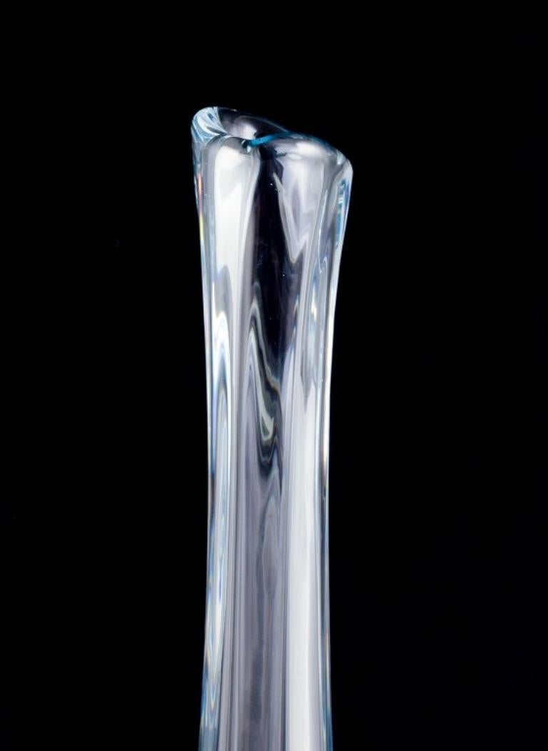 Mid-20th Century Nils Landberg for Orrefors, Sweden. Tall and slender art glass vase. For Sale
