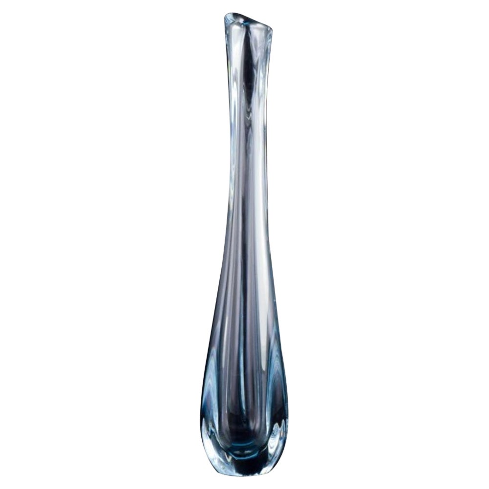 Nils Landberg for Orrefors, Sweden. Tall and slender art glass vase.
