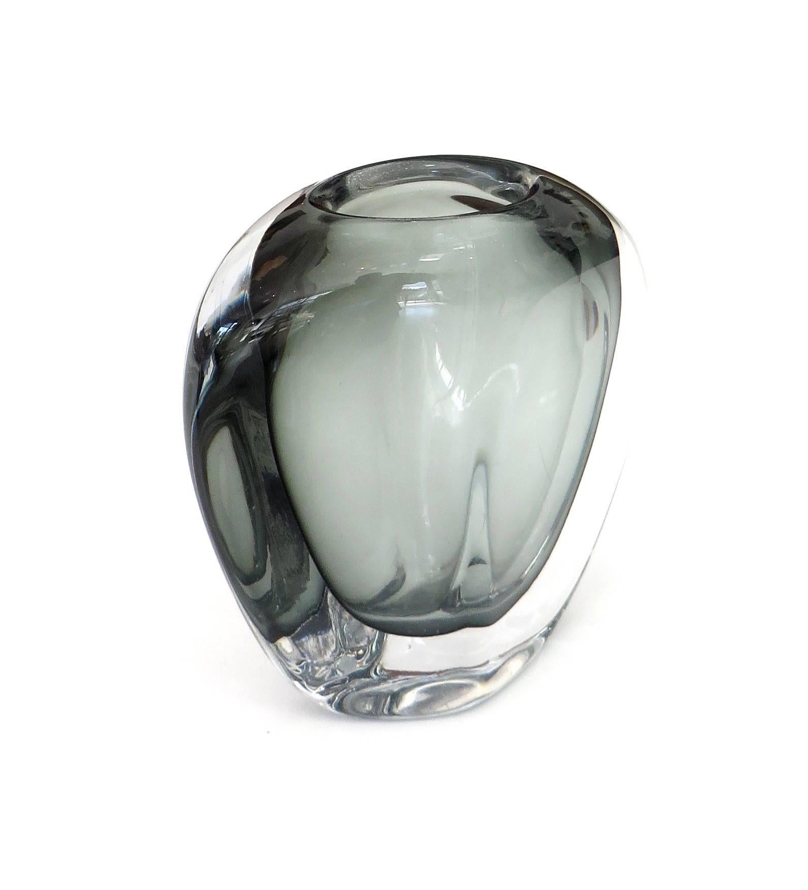 A Swedish vintage 'Sommerso' glass dusk vase by Nils Landberg for Orrefors, circa 1950s. The piece has a smoked charcoal interior, cased within a clear glass layer. Very good vintage condition, with age appropriate wear, including some scratches to