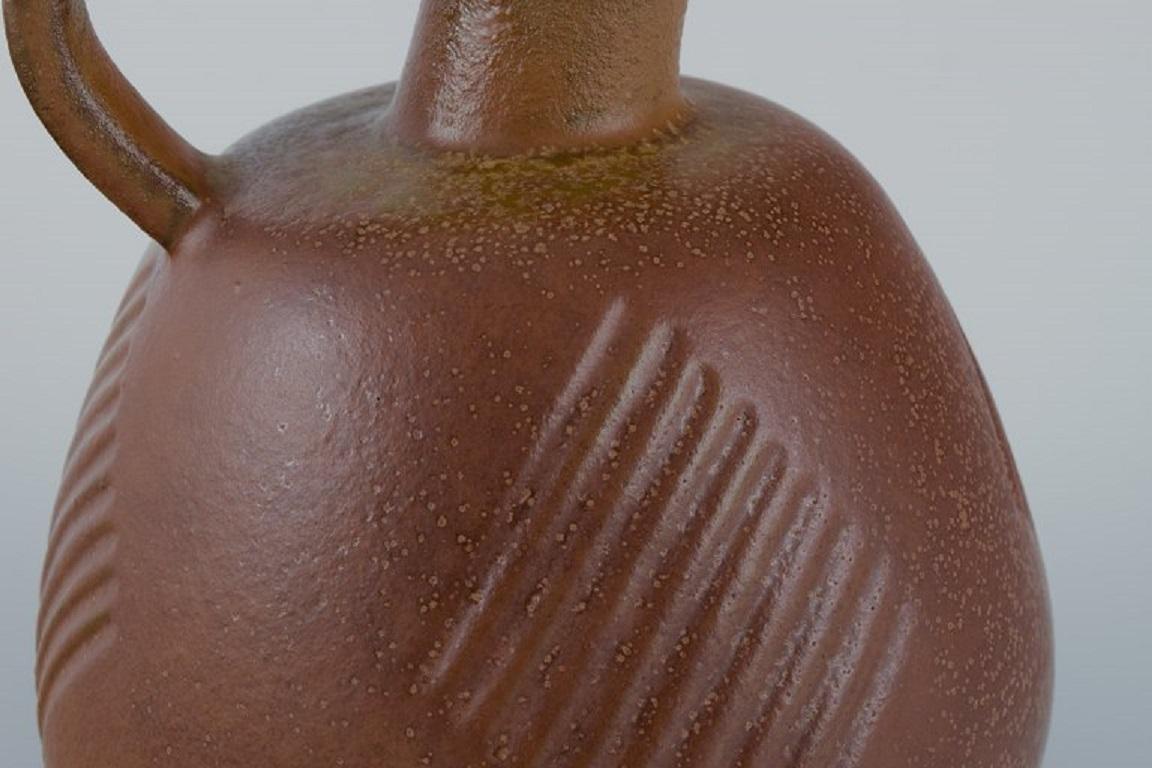 Glazed Nils Thorsson for Royal Copenhagen, Stoneware Jug with Brown Glaze For Sale
