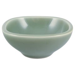 Nils Thorsson for Royal Copenhagen. Ceramic bowl in celadon glaze.