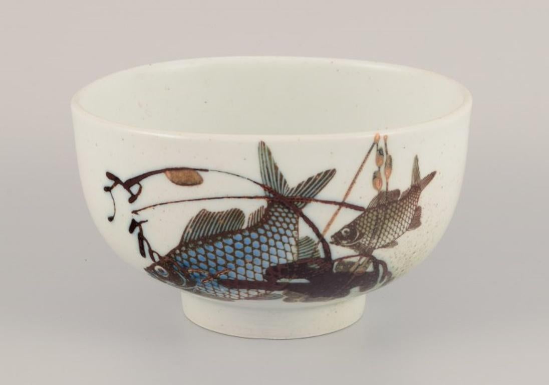 Glazed Nils Thorsson for Royal Copenhagen. Faience bowl with fish motifs.  For Sale