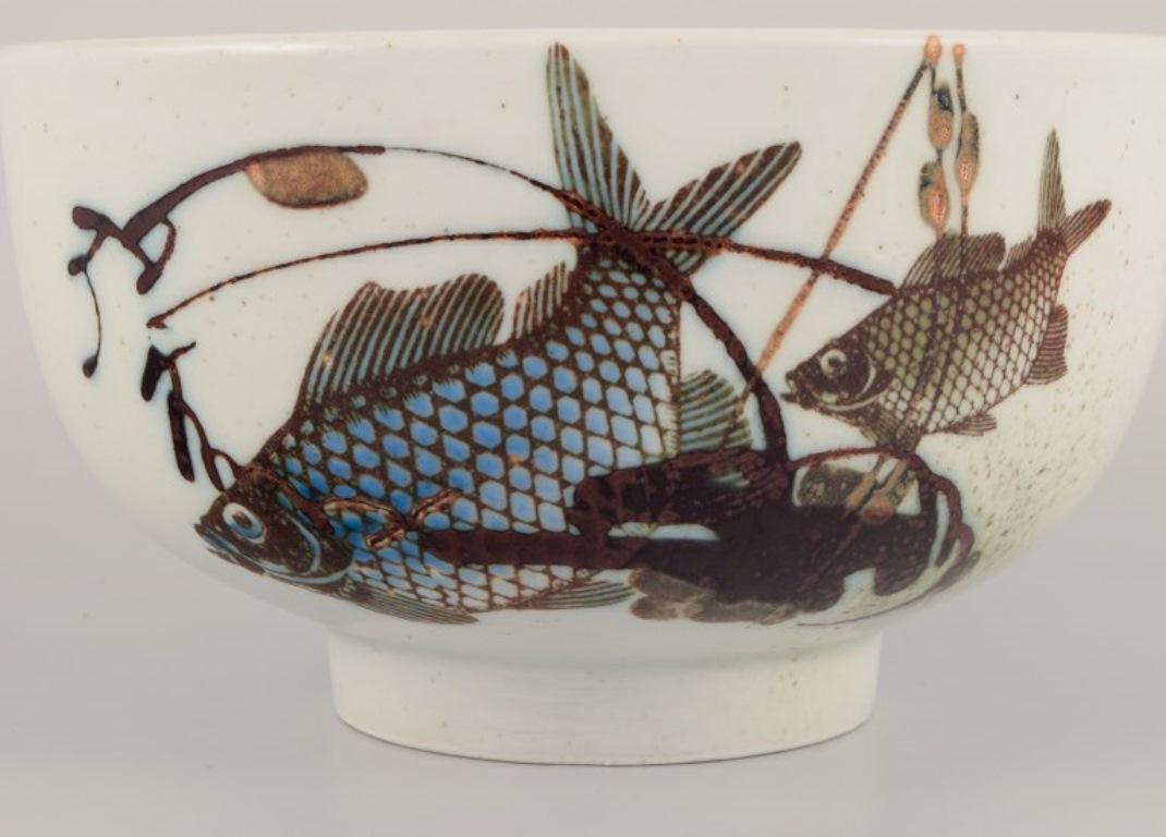 Late 20th Century Nils Thorsson for Royal Copenhagen. Faience bowl with fish motifs.  For Sale