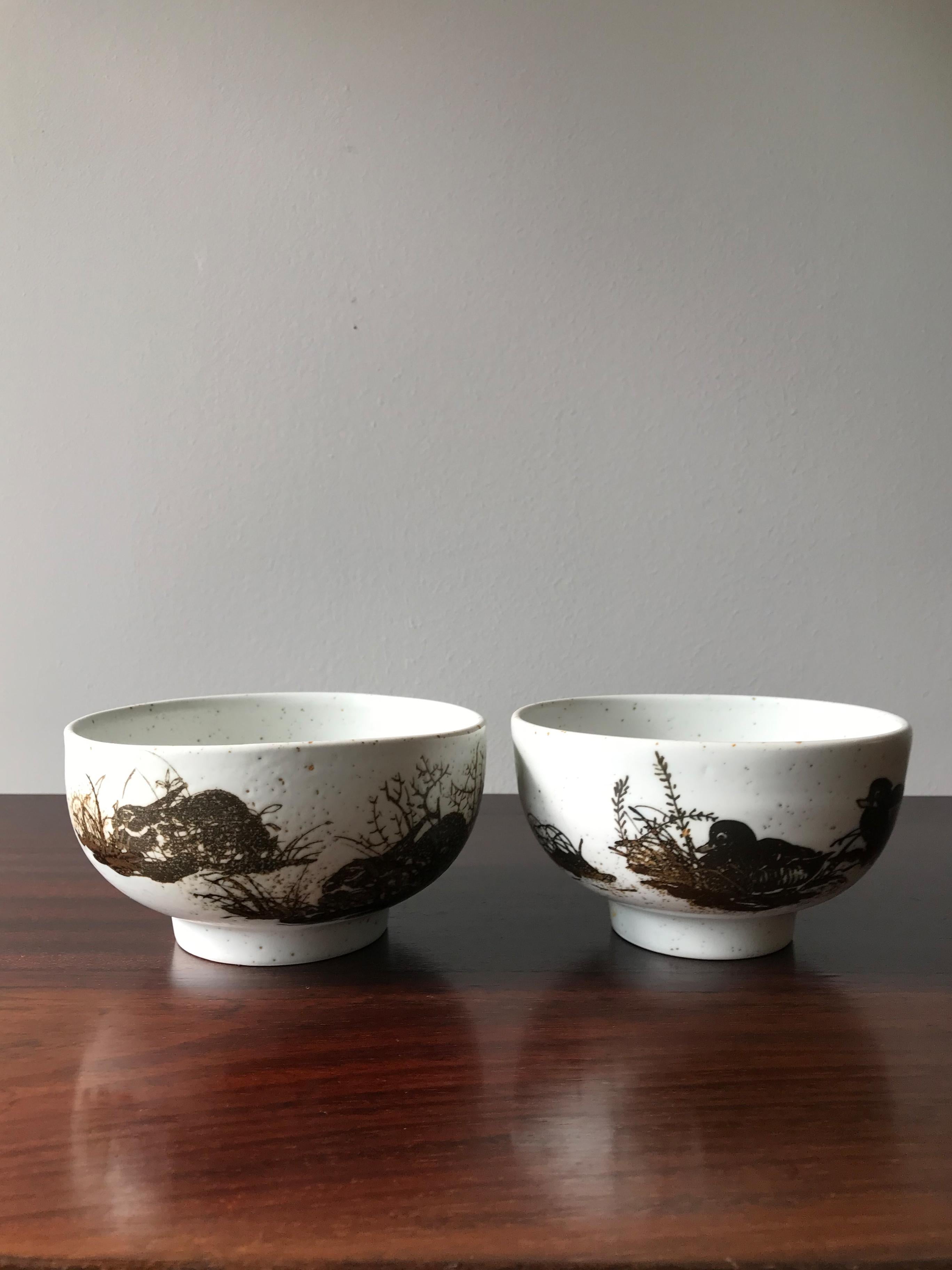 Danish ceramic bowls designed by Nils Thorsson and produced by Royal Copenhagen from 1960s, set of two.
Numbering and signature of the producer under the base.
Measurements:
height 8 cm - width 14 cm - depth 13 cm.