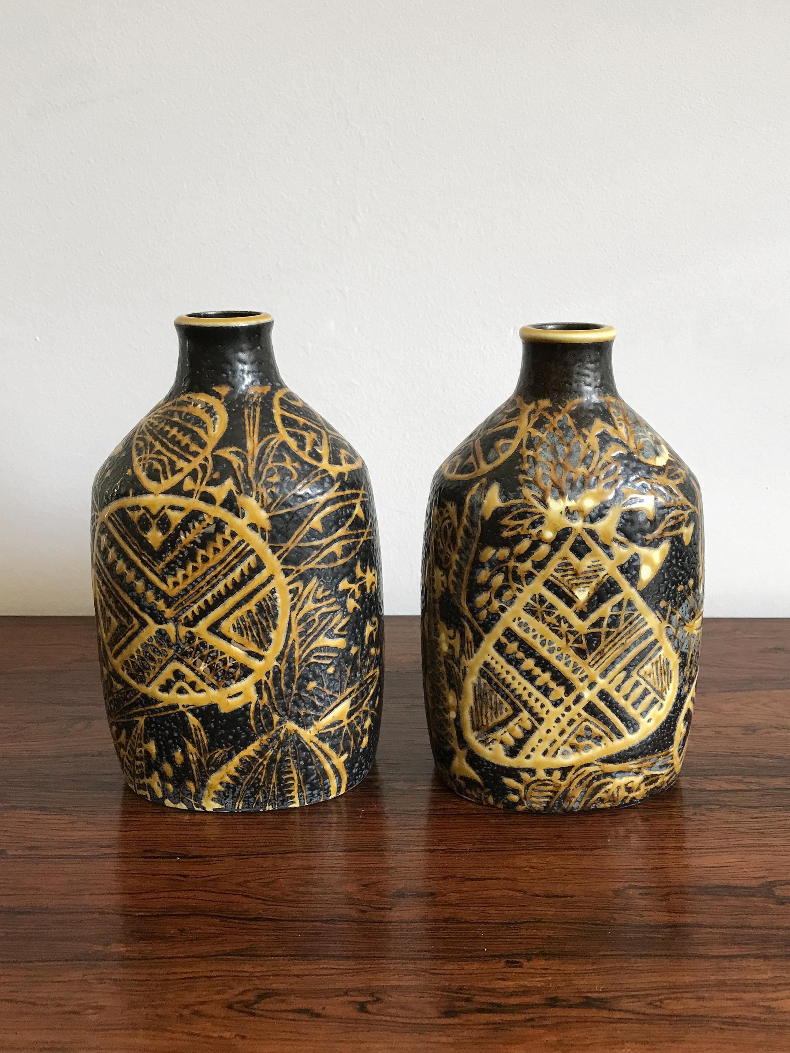 Couple of Danish ceramic vases designed by Nils Thorsson for Royal Copenhagen with mark printed on the bottom, circa 1960s.
Marked on the bottom.

Please note that the vases are original of the period and thus shows normal signs of age and use.
