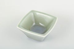 Nils Thorsson for Royal Copenhagen. Square ceramic bowl in green celadon glaze.