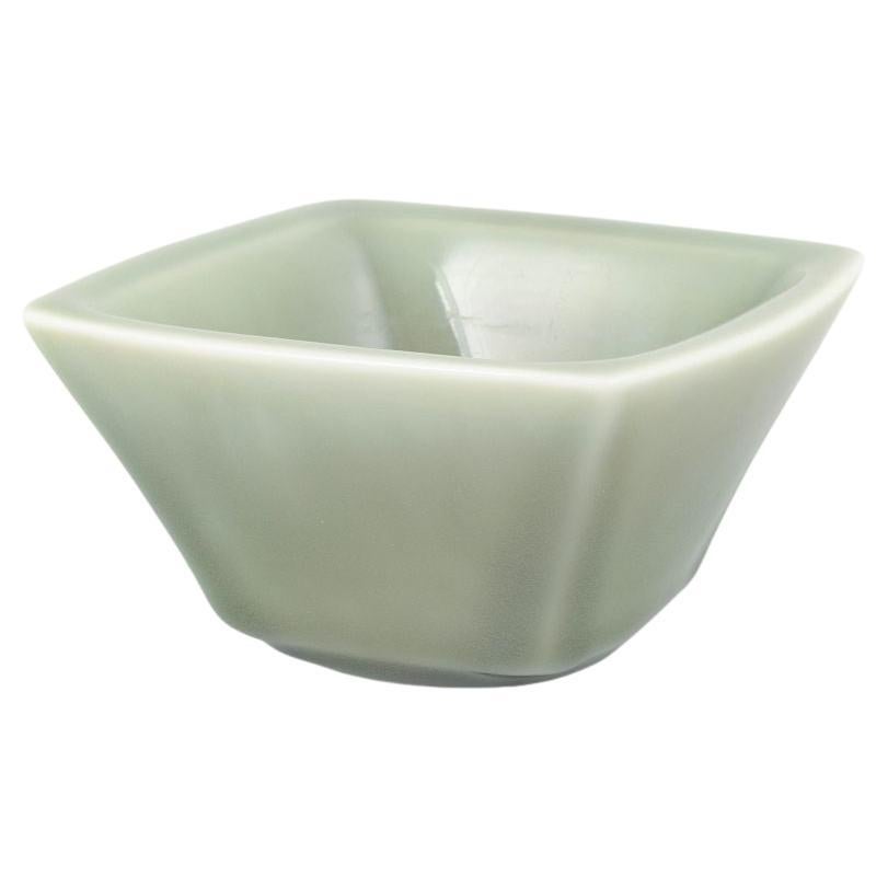 Nils Thorsson for Royal Copenhagen. Square ceramic bowl in green celadon glaze.