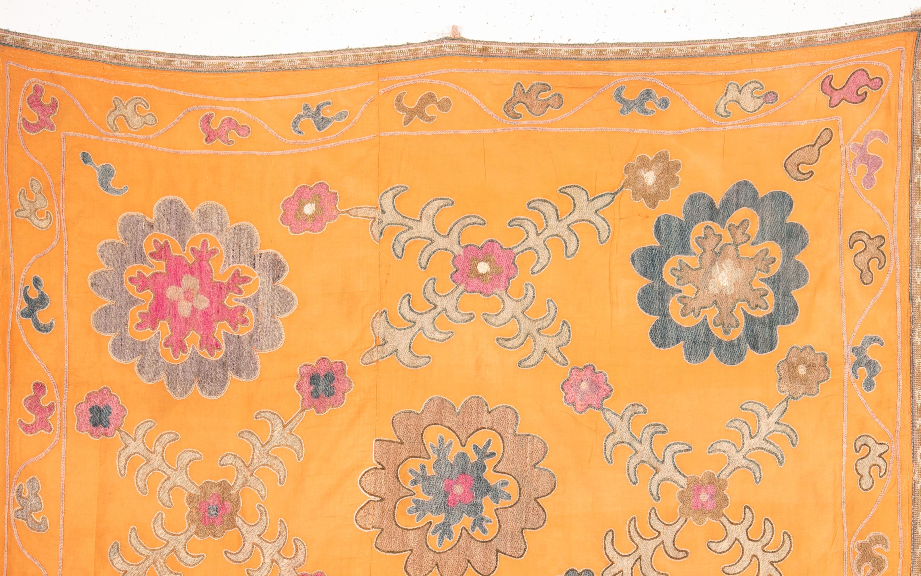 Silk embroidery on a cotton field.