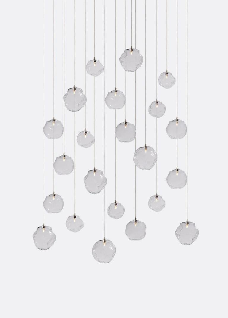 Hand-blown glass pendants fixtures. 22 glass pendants on 18