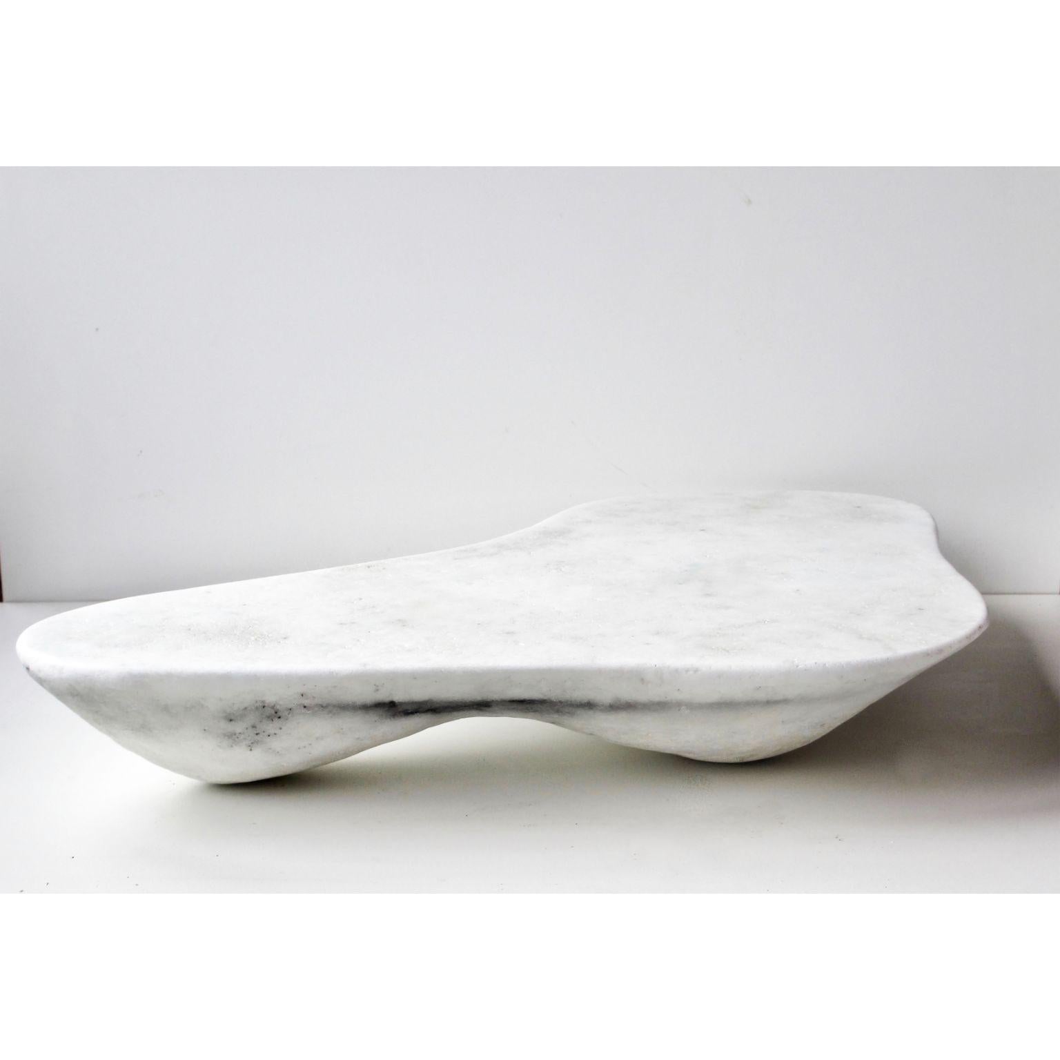 Nimbus Low Table by Roxane Lahidji
Dimensions: D 120 x W 55 x H 20 cm.
Materials: Marble Salt.
Weight: 180 kg.

Roxane Lahidji is a social designer specializing in ecological material developments and applications. Her research focuses on achieving