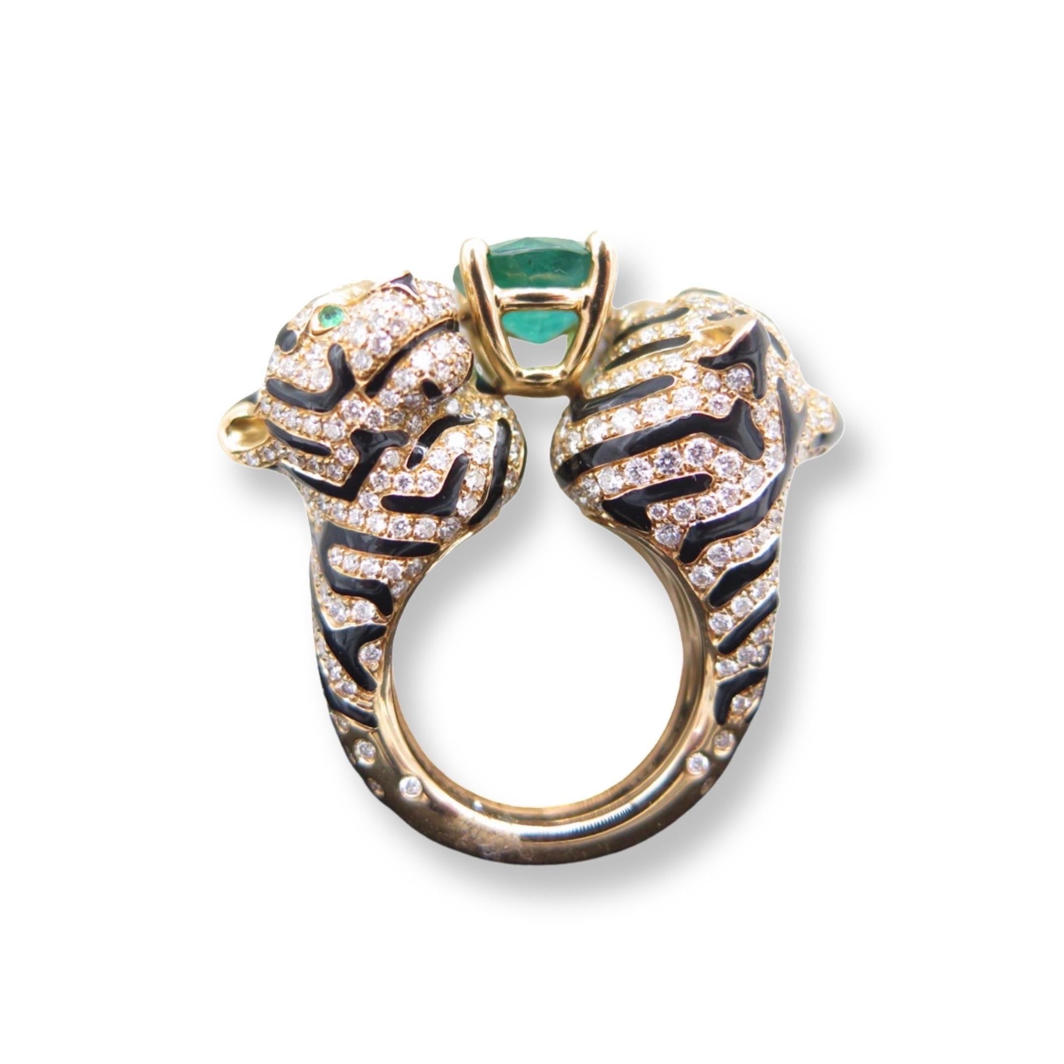 A, beautifully designed and crafted “Baby Tiger” ring by Nina & Ko, crafted in a beautiful 18kt pink gold it weighs 21.23g. It set with a beautiful 2.83ct Emerald in the center. This, “Baby Tiger” piece also includes an array of beautiful diamonds