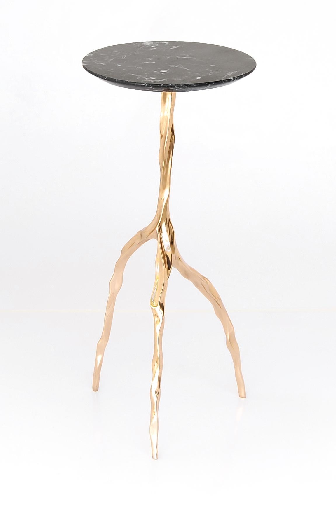 Nina drink table with Nero Marquina marble by Fakasaka Design
Dimensions: W 30 cm, D 30 cm, H 62 cm.
Materials: polished bronze base, Nero Marquina Marble top.
 
Also available in different table top materials:
Nero Marquina Marble 
Marrom