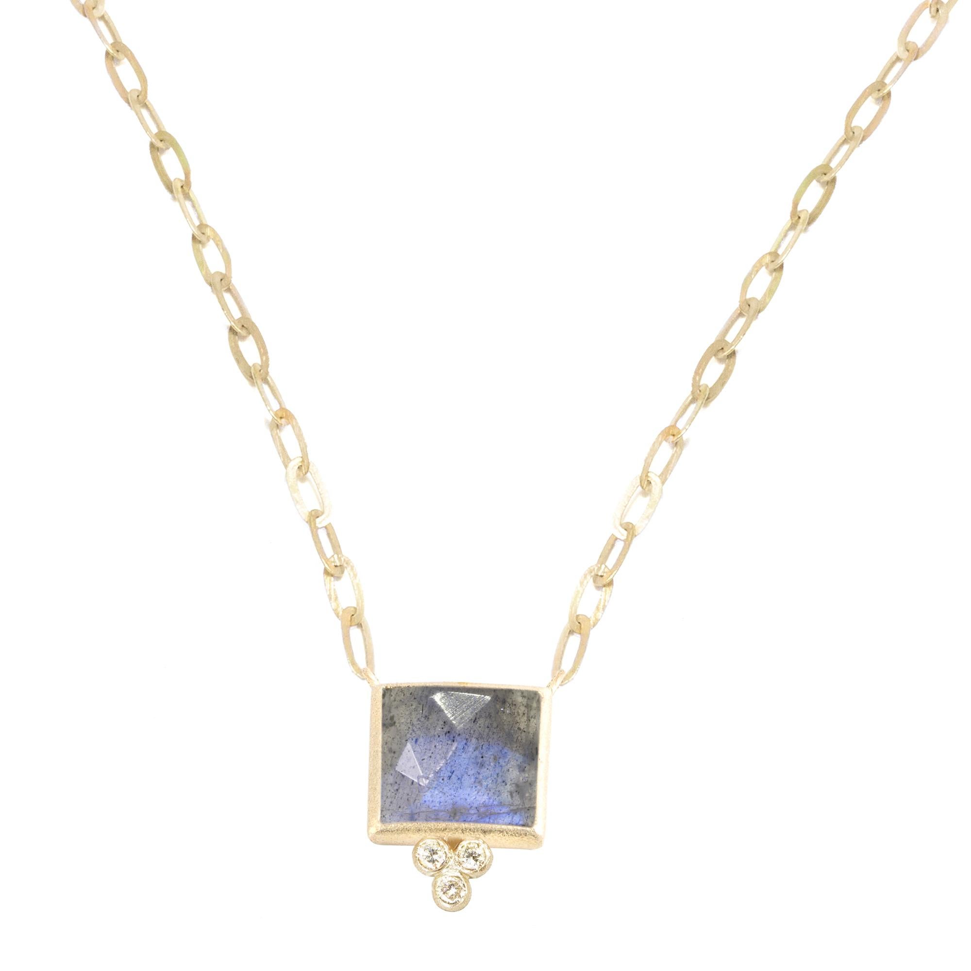 Square dance: Designed with hand-faceted labradorite in a textured gold bezel on a delicate link chain, our diamond-accented Ariana Gold Necklace can be worn on its own o layered with other styles.

Metal: 18K Yellow Gold
Stone carat: 4.2
Diamond