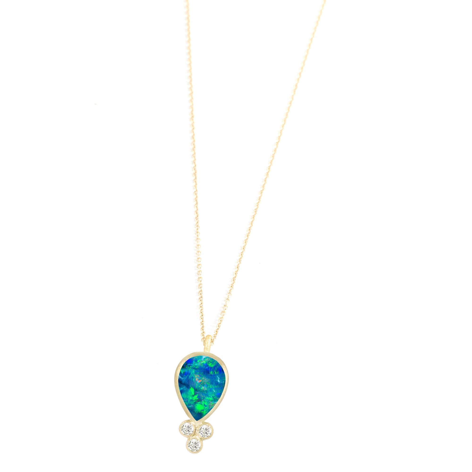 With its single, bezel-set opal doublet, the diamond-accented Lilly Gold Necklace is clean and elegant, and a very feminine style you can wear day in, day out.

Metal: 18K Yellow Gold
Stone carat: 1
Diamond carat: 0.0225
Length: 16-18''
Stone size: