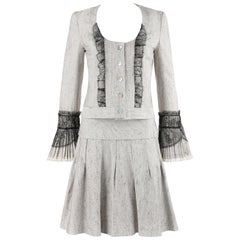 NINA RICCI - Ensemble 2 pièces robe et jupe plissée en tweed de soie gris et noir avec dentelle