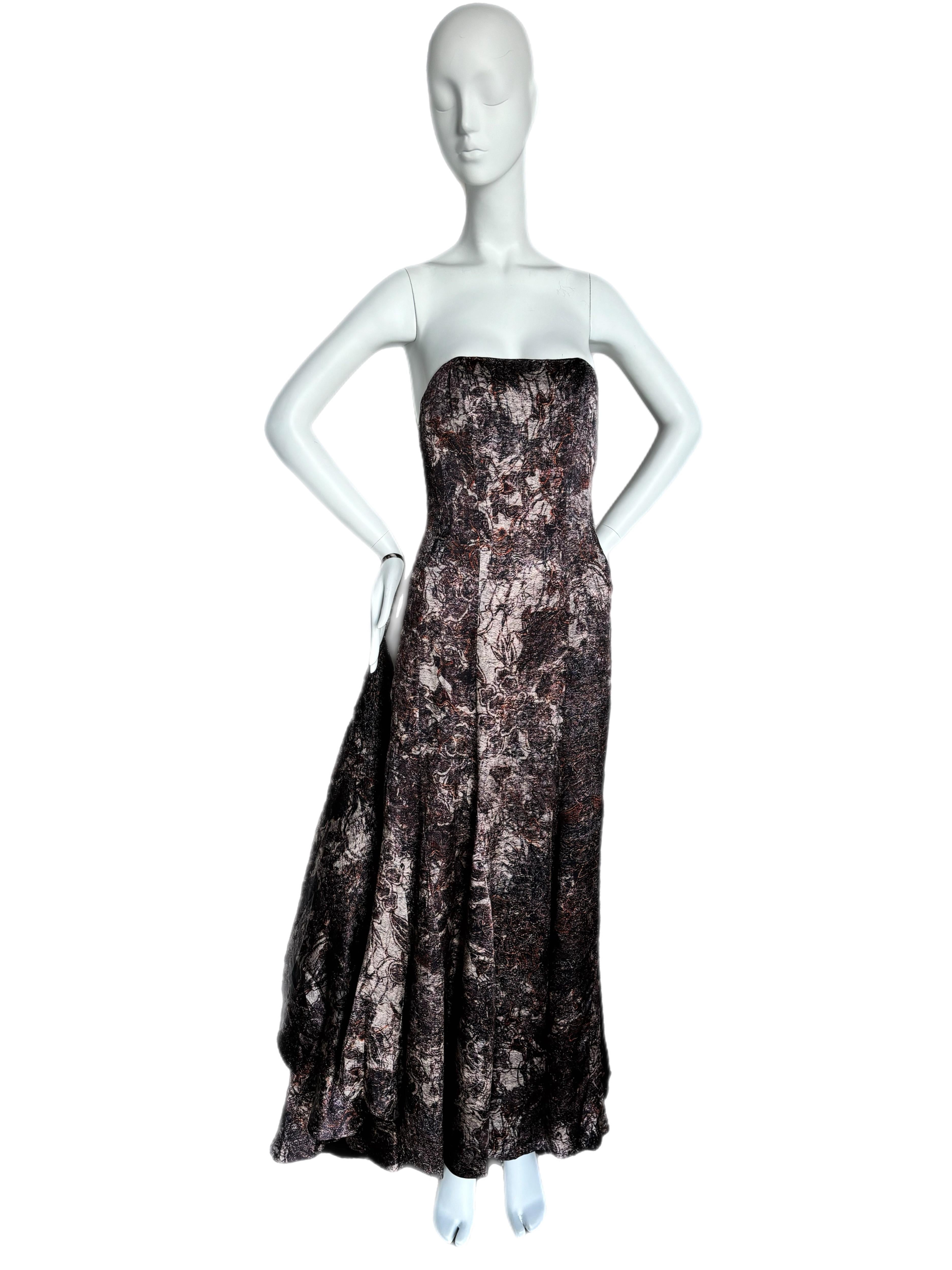 Nina Ricci
FW08
Vintage
Runway
Silk exterior
Purple, orange, gray hues mix together for an amazing Fall/Winter Gown
Looks, and was, extremely expensive
A true Bell of the Ball gown
Has a large loop to be worn around wrist when picking up train
F40,