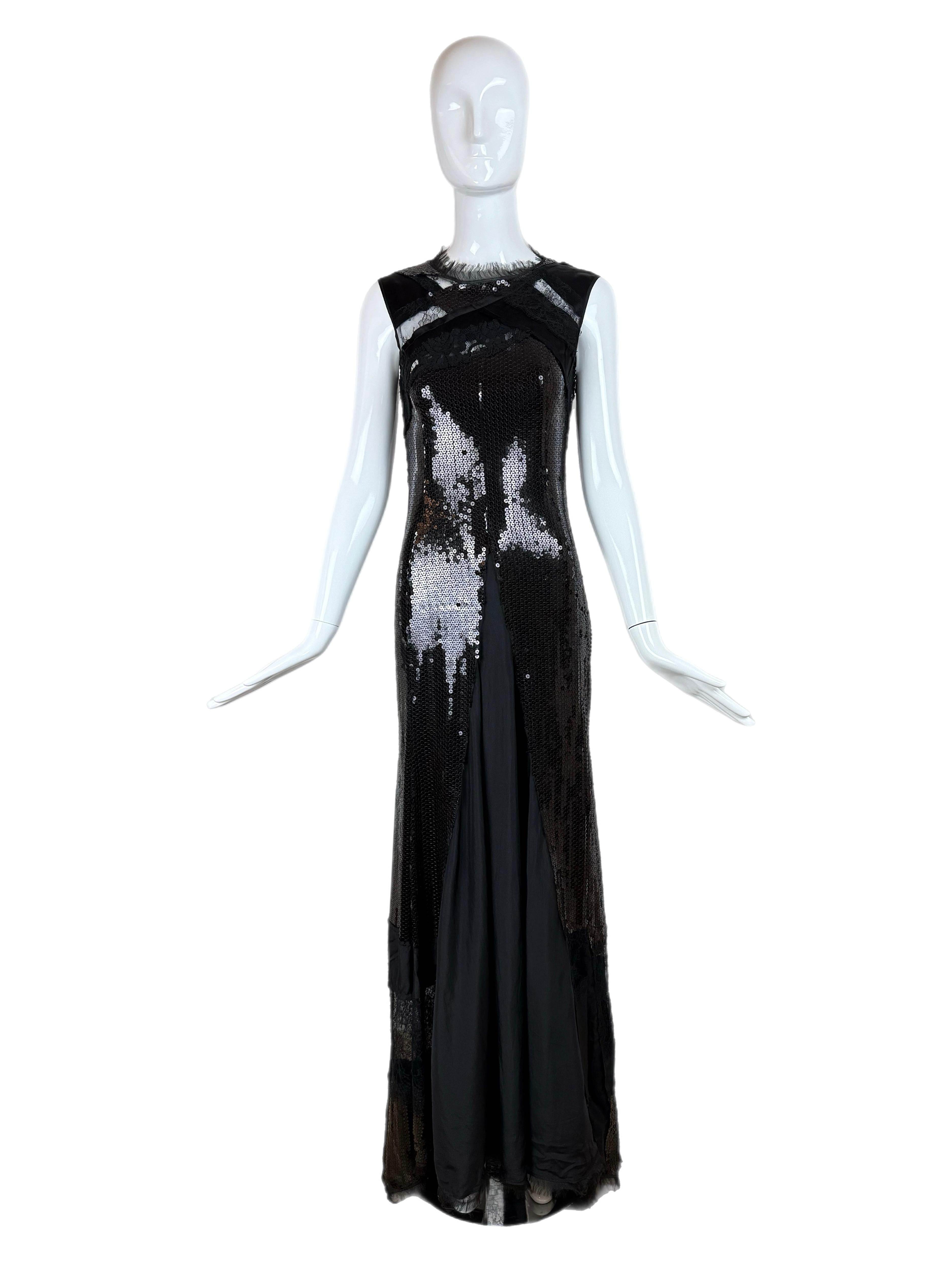 Nina Ricci
Vintage
Pista
Pre-Autunno 2013
Look nero lucido
Paillettes e pizzo trasparente
Ha dei lacci sotto per creare tanti microbustini nel caso in cui tu voglia 