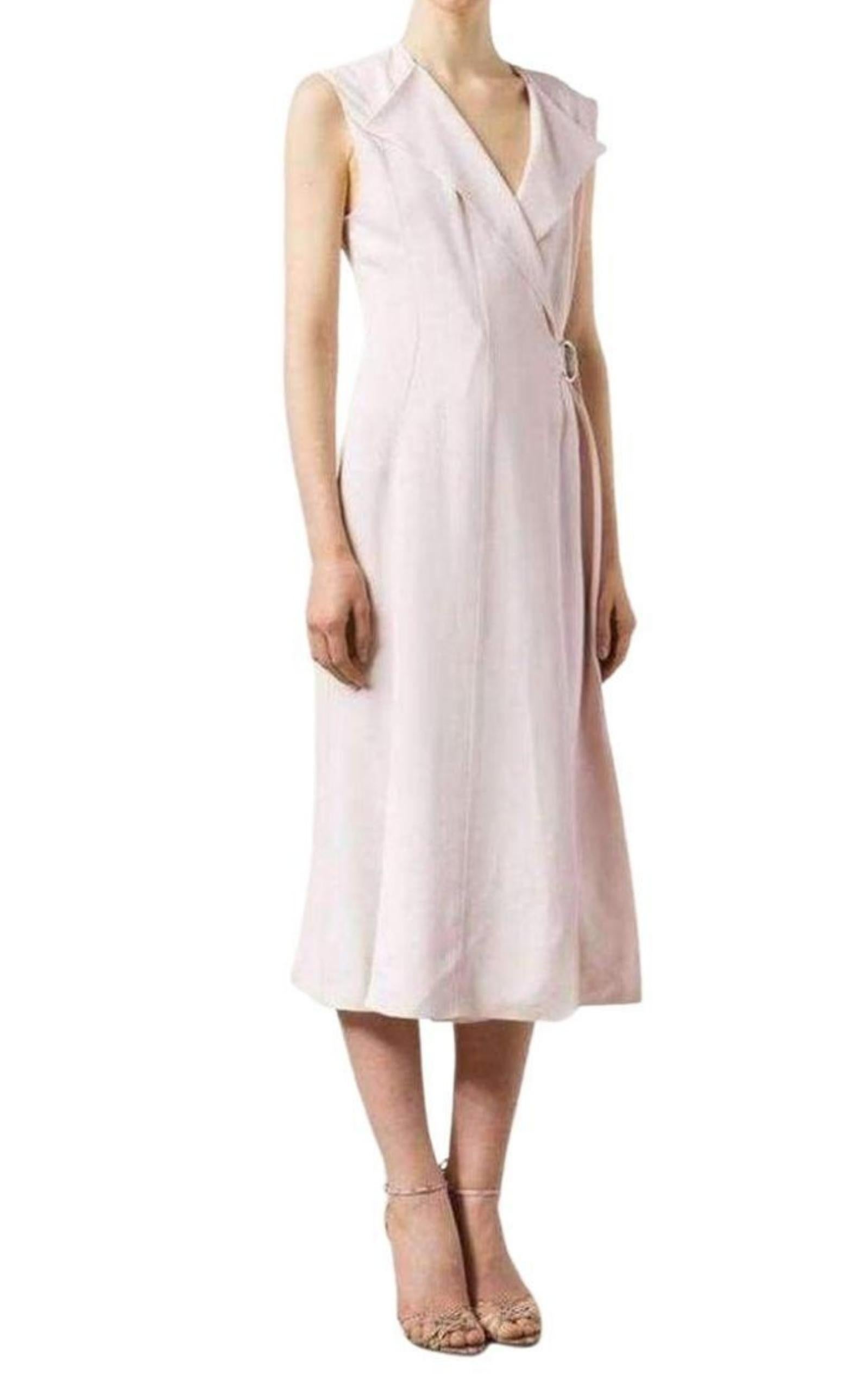 Rose pink crepe sleeveless wrap dress.
Lapels, exposed vertical seams at front and back
Attached D-ring belt
Multi-slit skirt
47