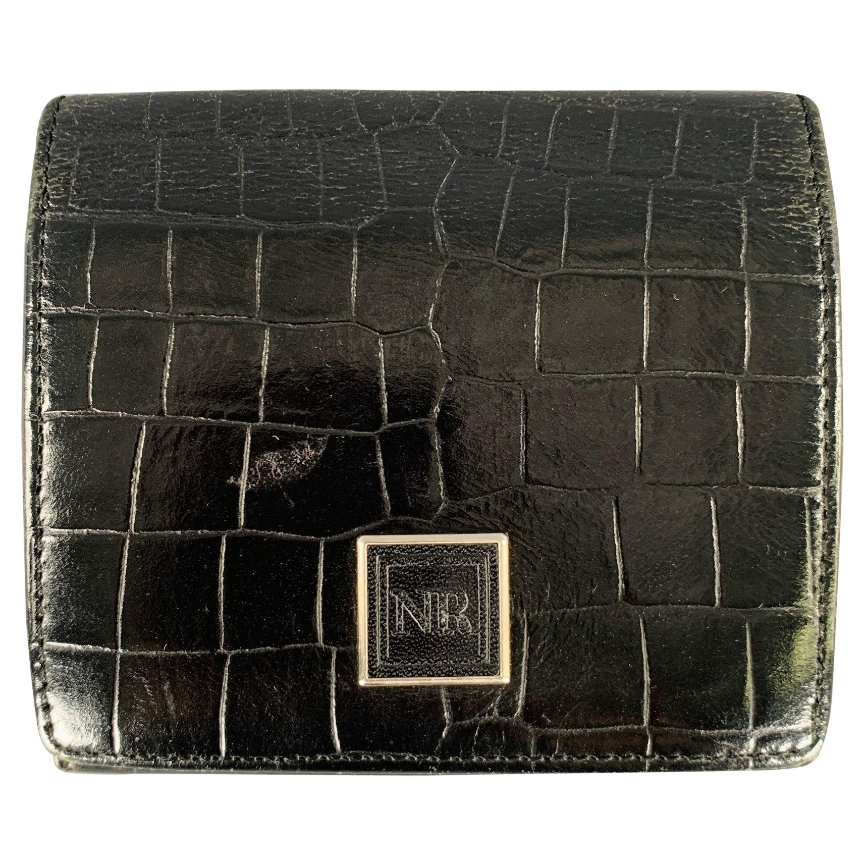 NINA RICCI Billetera Bifold de piel negra con cocodrilo en relieve en venta