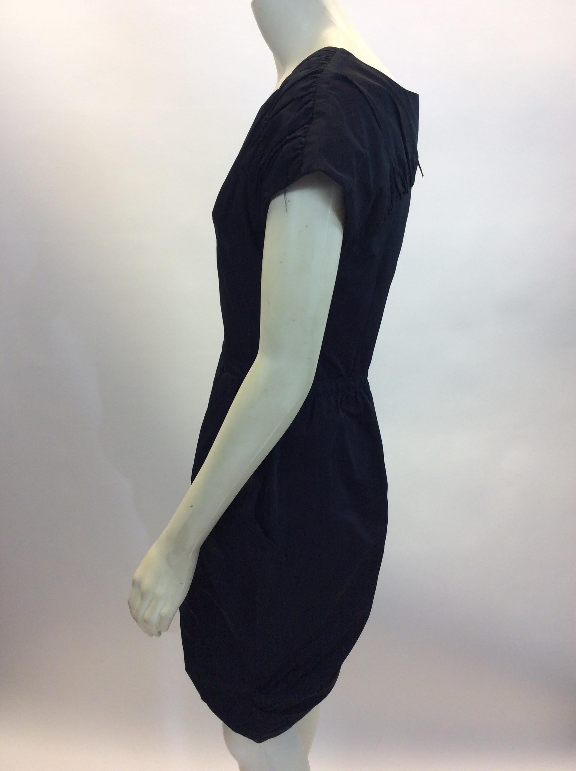 Nina Ricci Black Dress
$165
Made in Italy
70% Polyester, 30% Silk
Size 38
Length 34