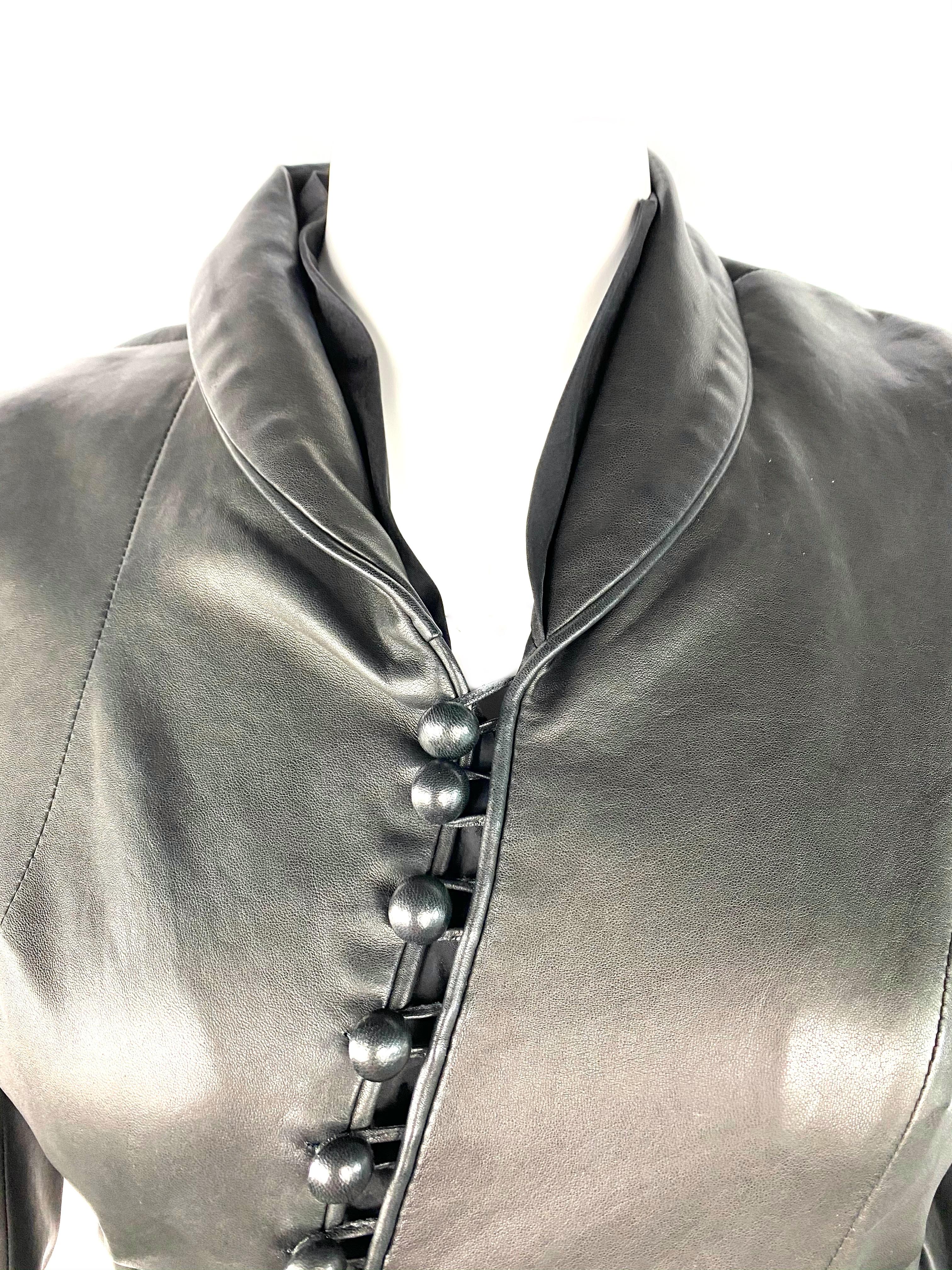 Product details:

100% lamb leather jacket designed by Nina Ricci, featuring collar, side pocket and front asymmetric button down closure.
Made in France.