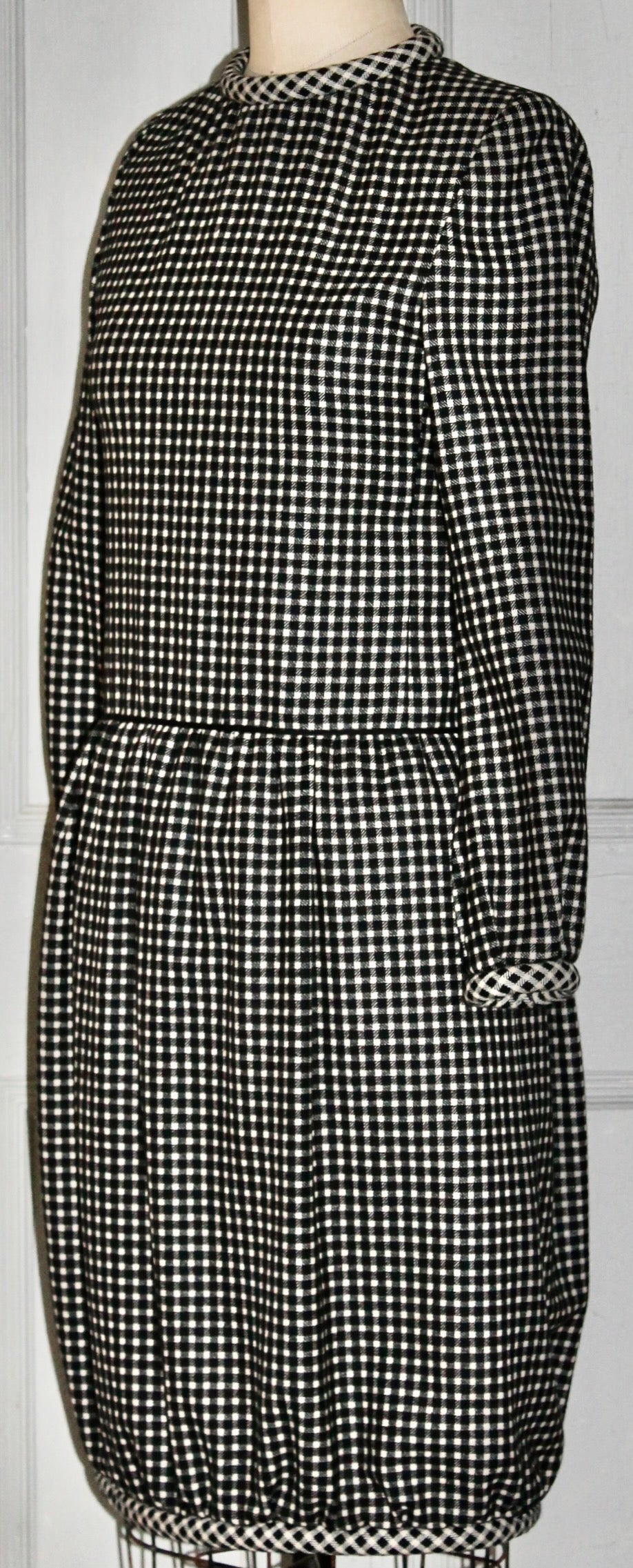 Offering a Nina Ricci 'Boutique' 100% Wool Dress. Rolled collar and rolled hem.  Fully lined.
