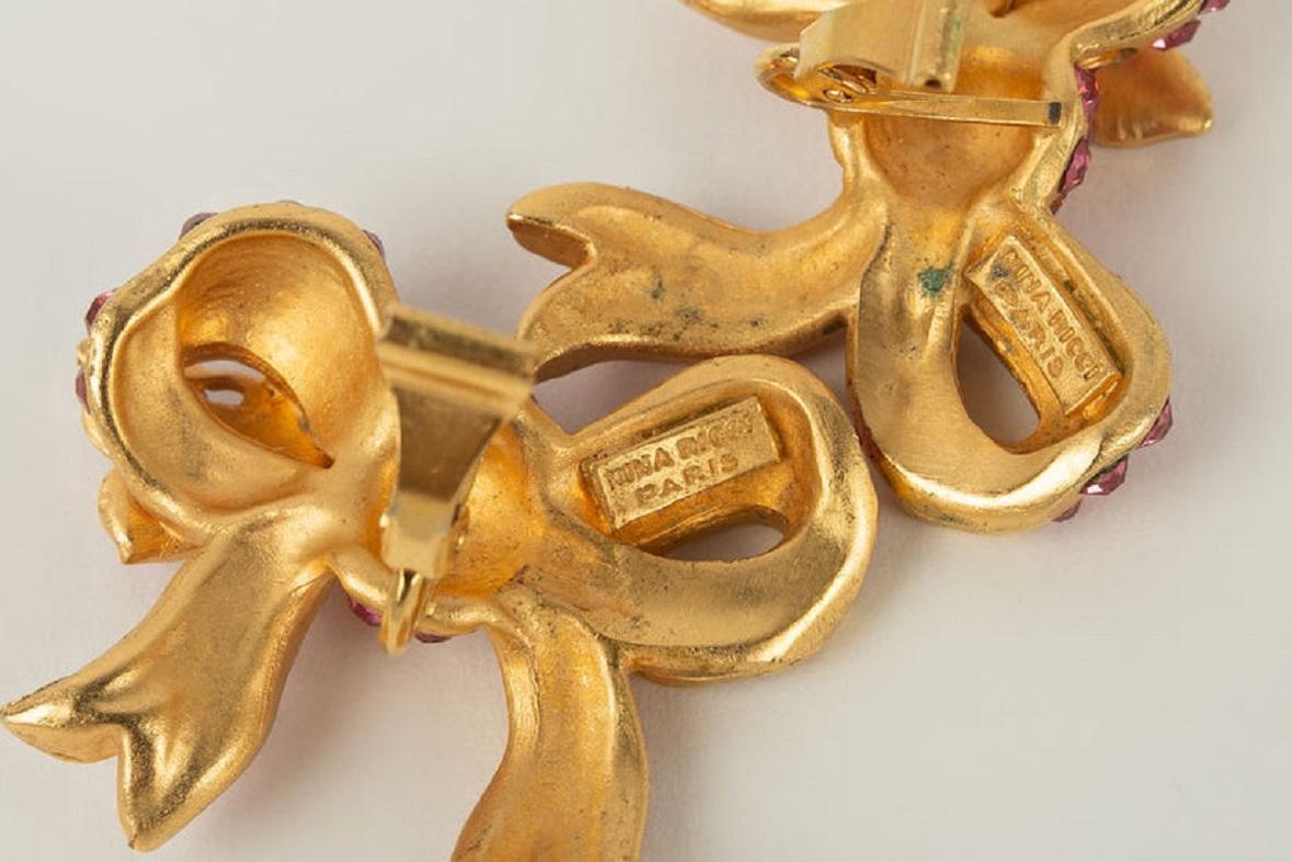 Nina Ricci Earrings Featuring a Golden Metal Bow Paved with Pink Rhinestones For Sale 2