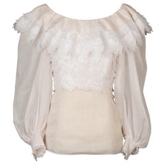 Top a balze di Nina Ricci in bianco e rosa pallido