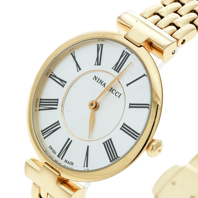 Perfect to assist you and enhance all your chic ensembles, this Nina Ricci watch comes beautifully crafted from gold-plated stainless steel metal with a slim round case. It features a silver-white dial with Roman numeral hour markers and two