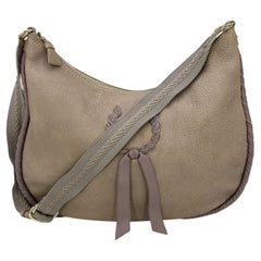 Bolso hobo de piel gris Nina Ricci